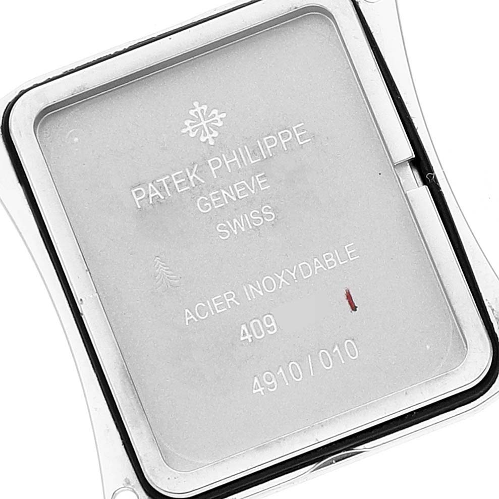 The image shows the back casing of a Patek Philippe Twenty-4 4910/10A-010 Women's Stainless Steel Silver Dial 4910/10A-010 Women's Stainless Steel Silver Dial watch, showcasing the model details and brand information.