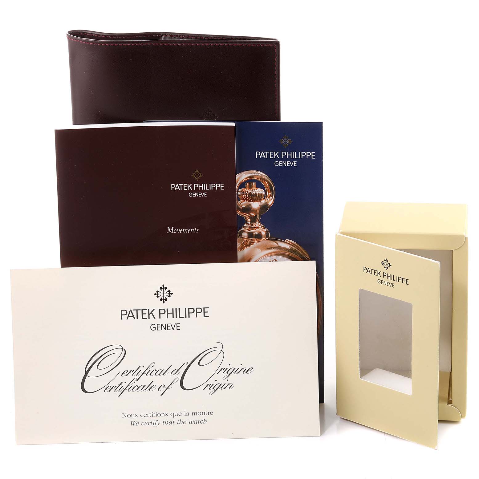 The image shows the certificate, manuals, holder, and leather wallet for a Patek Philippe Twenty-4 4910/10A-010 Women's Stainless Steel Silver Dial 4910/10A-010 Women's Stainless Steel Silver Dial model from a frontal angle.