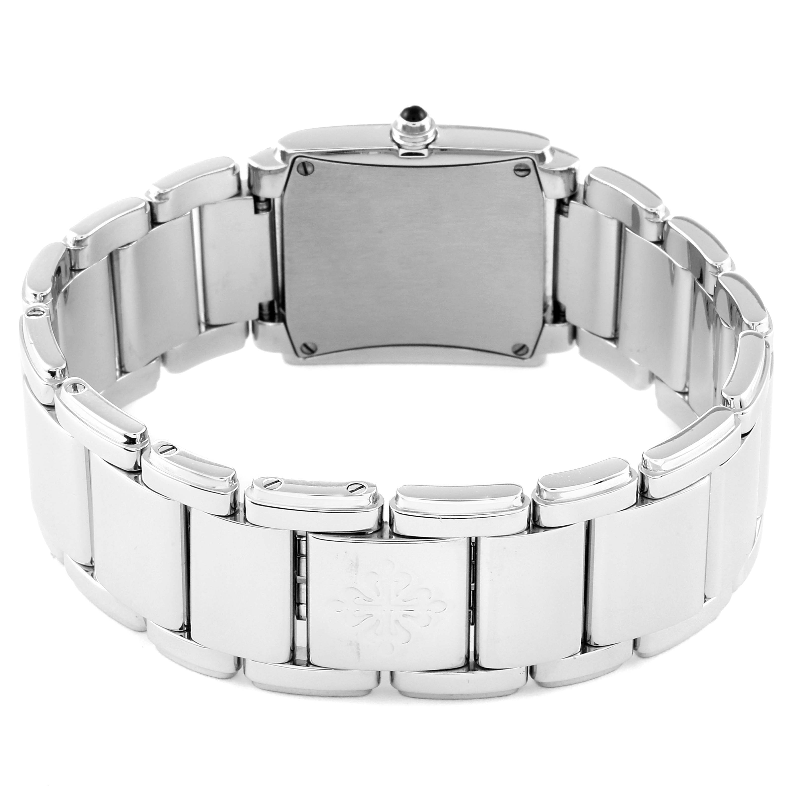 The image shows the back view of a Patek Philippe Twenty-4 4910/10A-010 Women's Stainless Steel Silver Dial 4910/10A-010 Women's Stainless Steel Silver Dial model watch, highlighting its stainless steel bracelet and clasp.