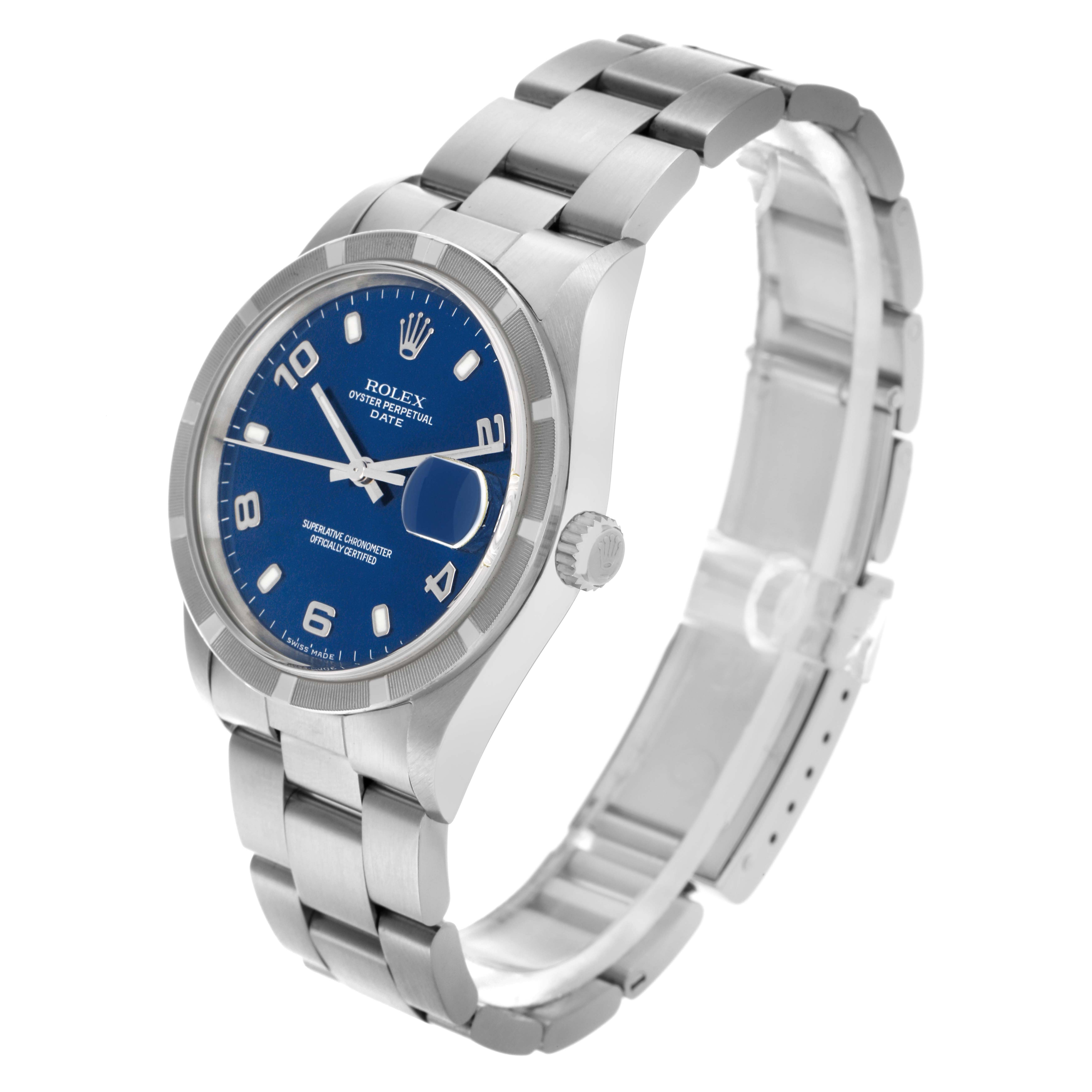 The Rolex Date 15210 Men
s Stainless Steel Blue Dial 15210 Men
s Stainless Steel Blue Dial watch is shown at an oblique angle, highlighting the blue dial, bezel, crown, and stainless steel bracelet.