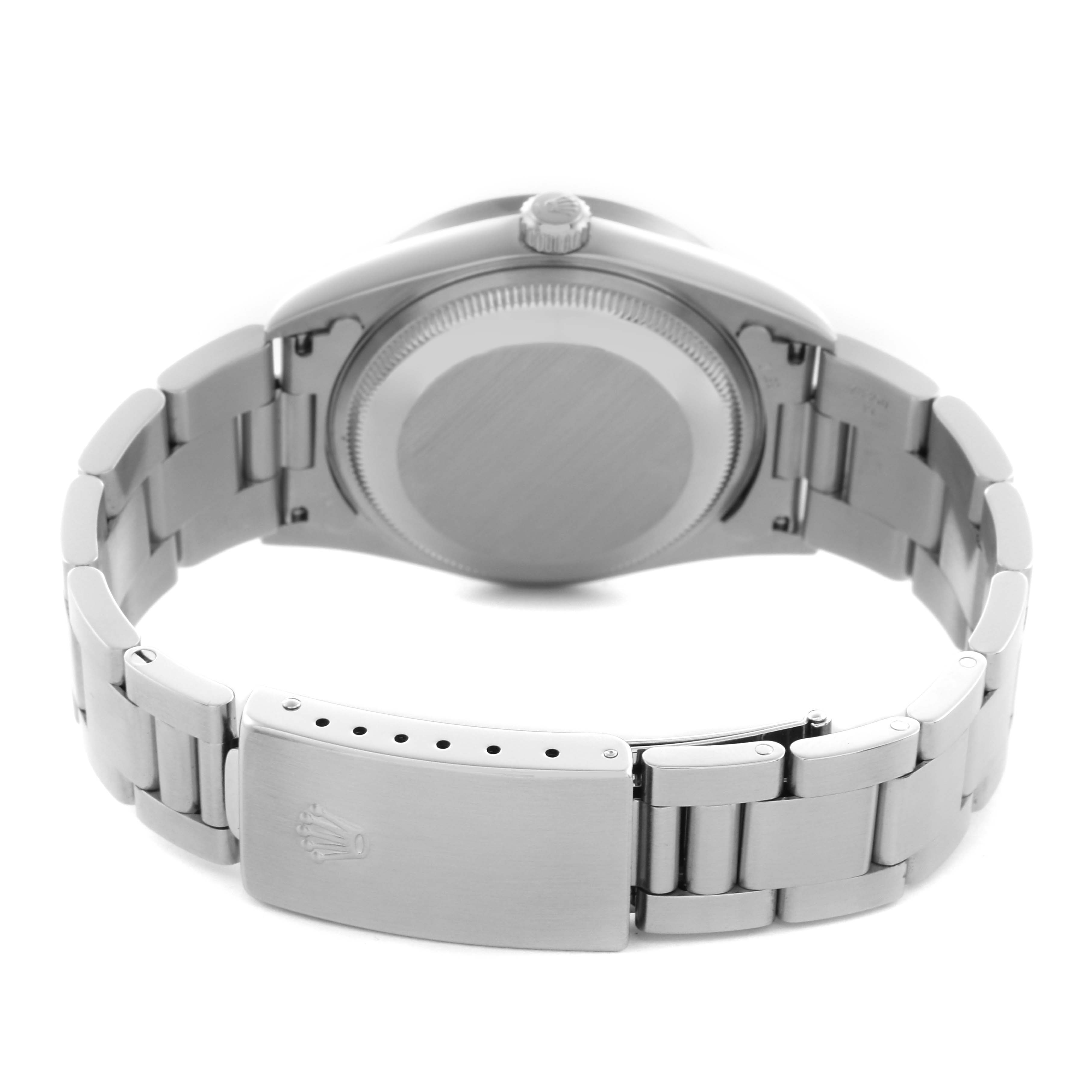 The image shows the back case and bracelet of a Rolex Date 15210 Men
s Stainless Steel Blue Dial 15210 Men
s Stainless Steel Blue Dial watch, highlighting the clasp and crown from the rear angle.