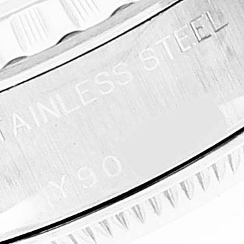 The image shows a close-up view of the stainless steel case back of a Rolex Date 79240 Women
s Stainless Steel Blue Dial 79240 Women
s Stainless Steel Blue Dial model watch.