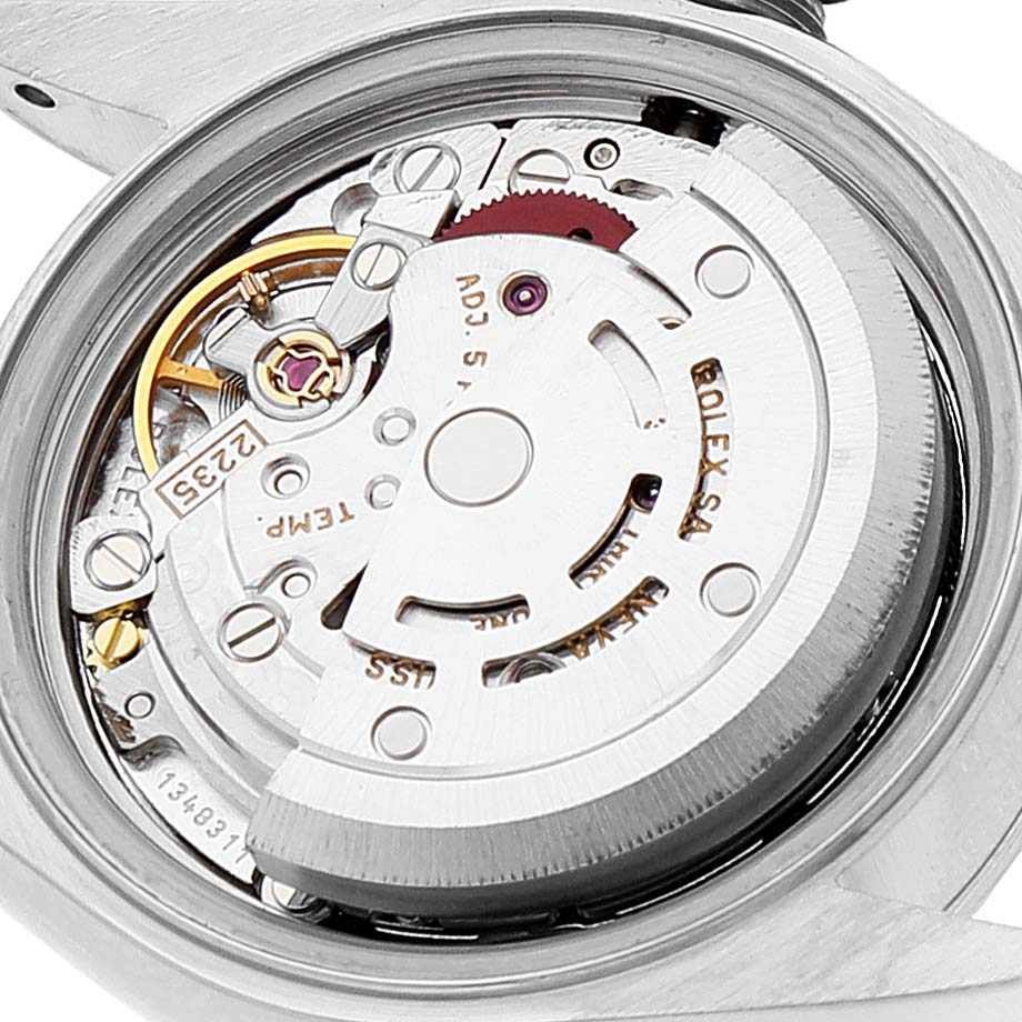 This image shows the internal mechanism and movement of a Rolex Date 79240 Women
s Stainless Steel Blue Dial 79240 Women
s Stainless Steel Blue Dial model watch from a close-up angle.