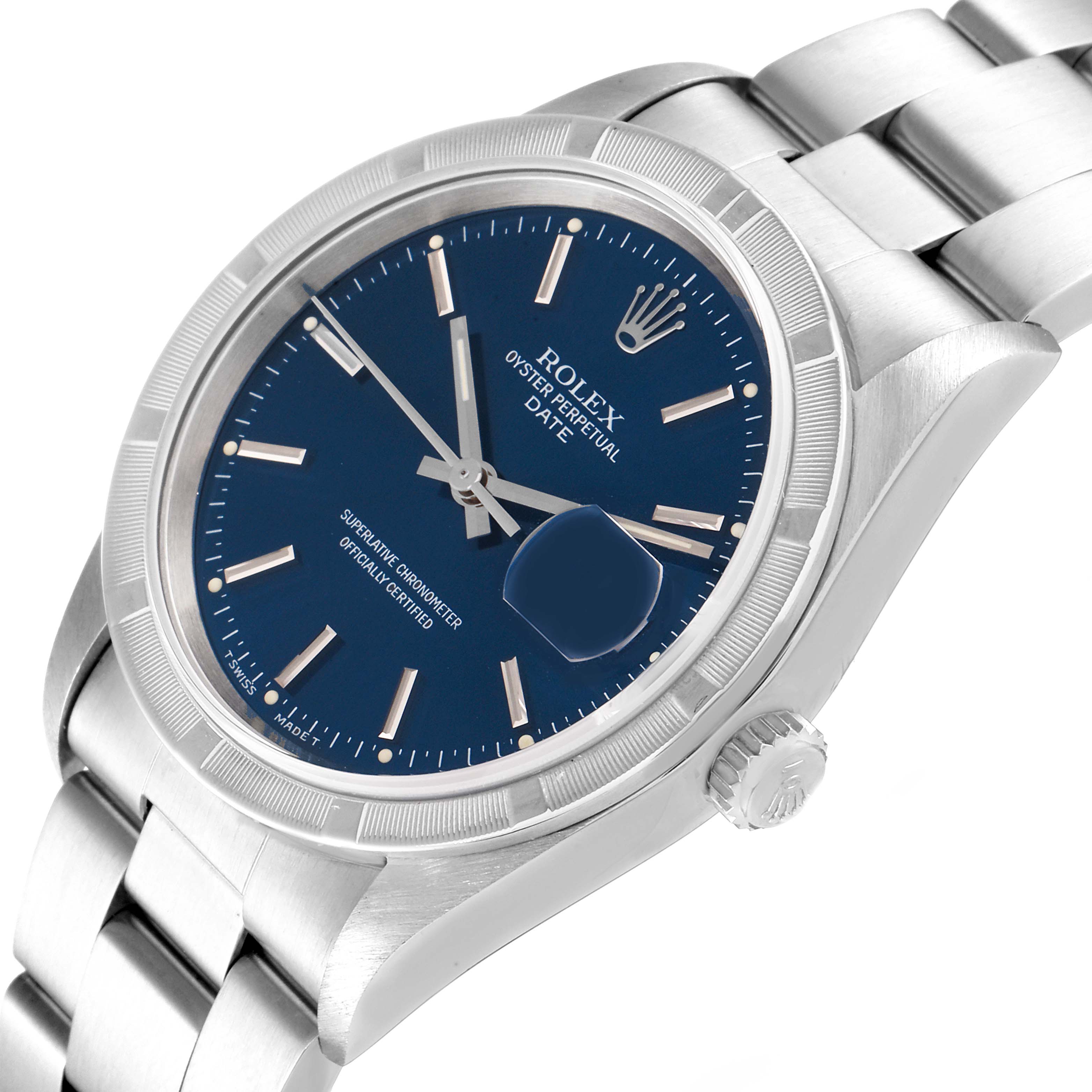 The image shows a Rolex Date 15210 Men's Stainless Steel Blue Dial 15210 Men's Stainless Steel Blue Dial watch at a slight angle, highlighting the blue dial, bezel, crown, and a portion of the bracelet.
