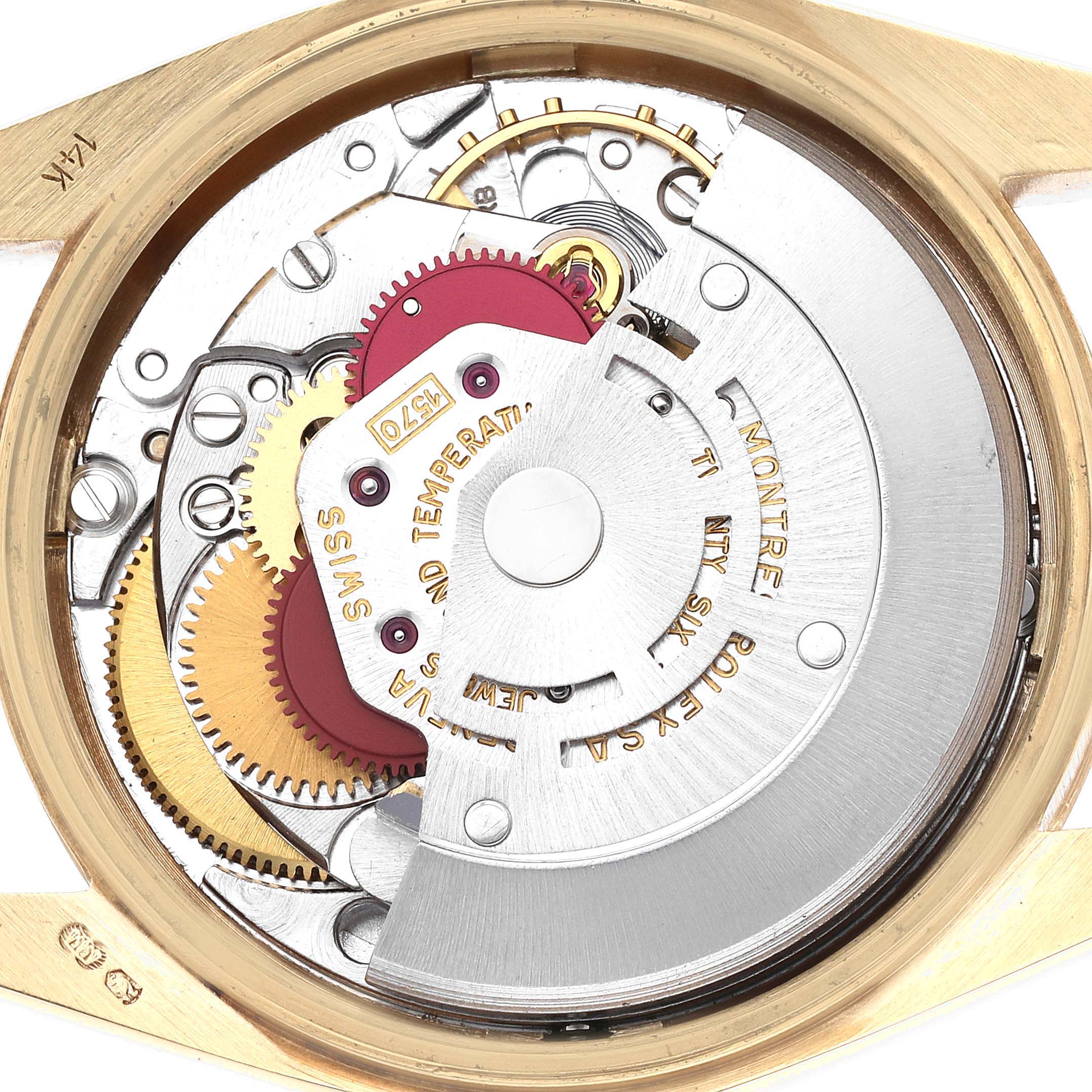 The image shows the movement and internal components of a Rolex Date watch from the back angle.