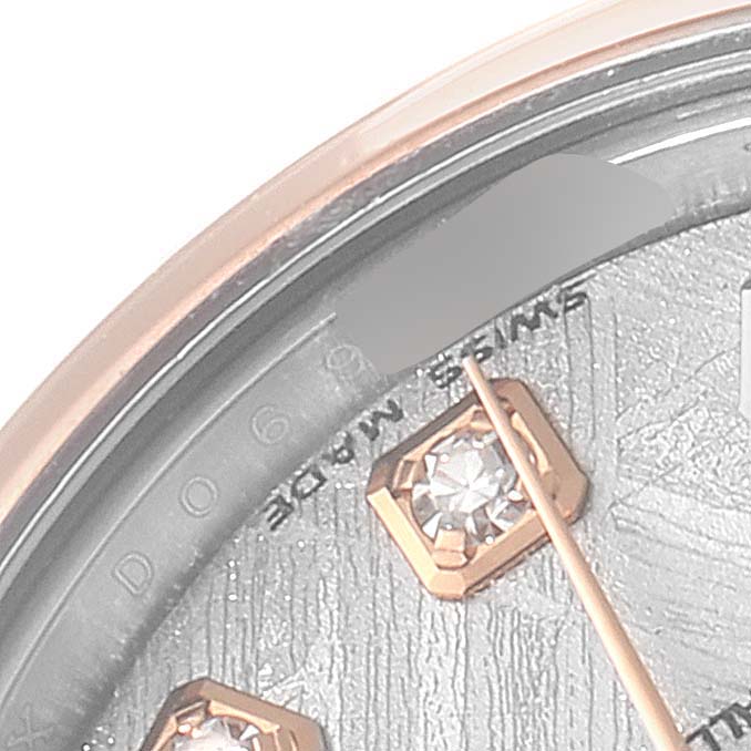 The image shows a close-up of the dial and diamond markers on a Rolex Datejust 179161 Women's Steel and Gold (two tone) Silver Dial 179161 Women's Steel and Gold (two tone) Silver Dial watch.