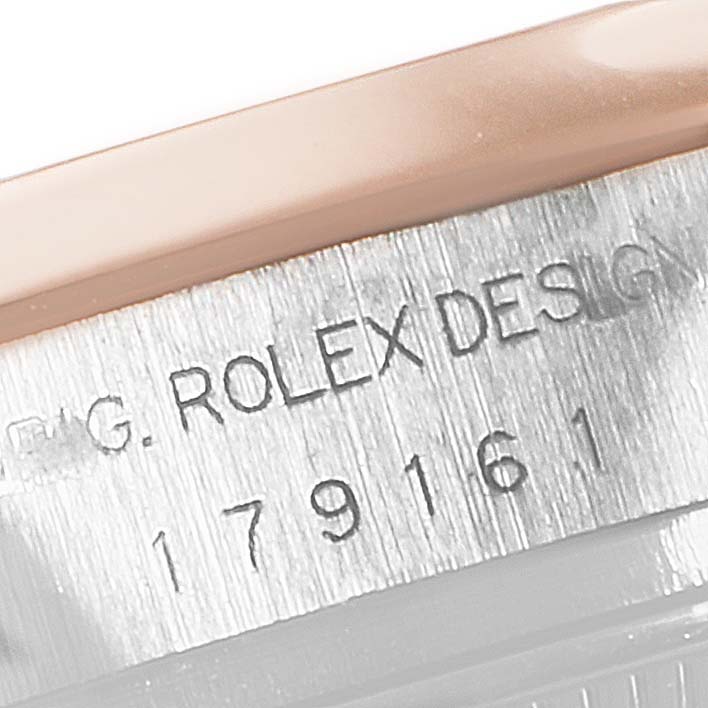 The image shows a close-up view of the case side of a Rolex Datejust 179161 Women's Steel and Gold (two tone) Silver Dial 179161 Women's Steel and Gold (two tone) Silver Dial watch, highlighting the model number engraved.