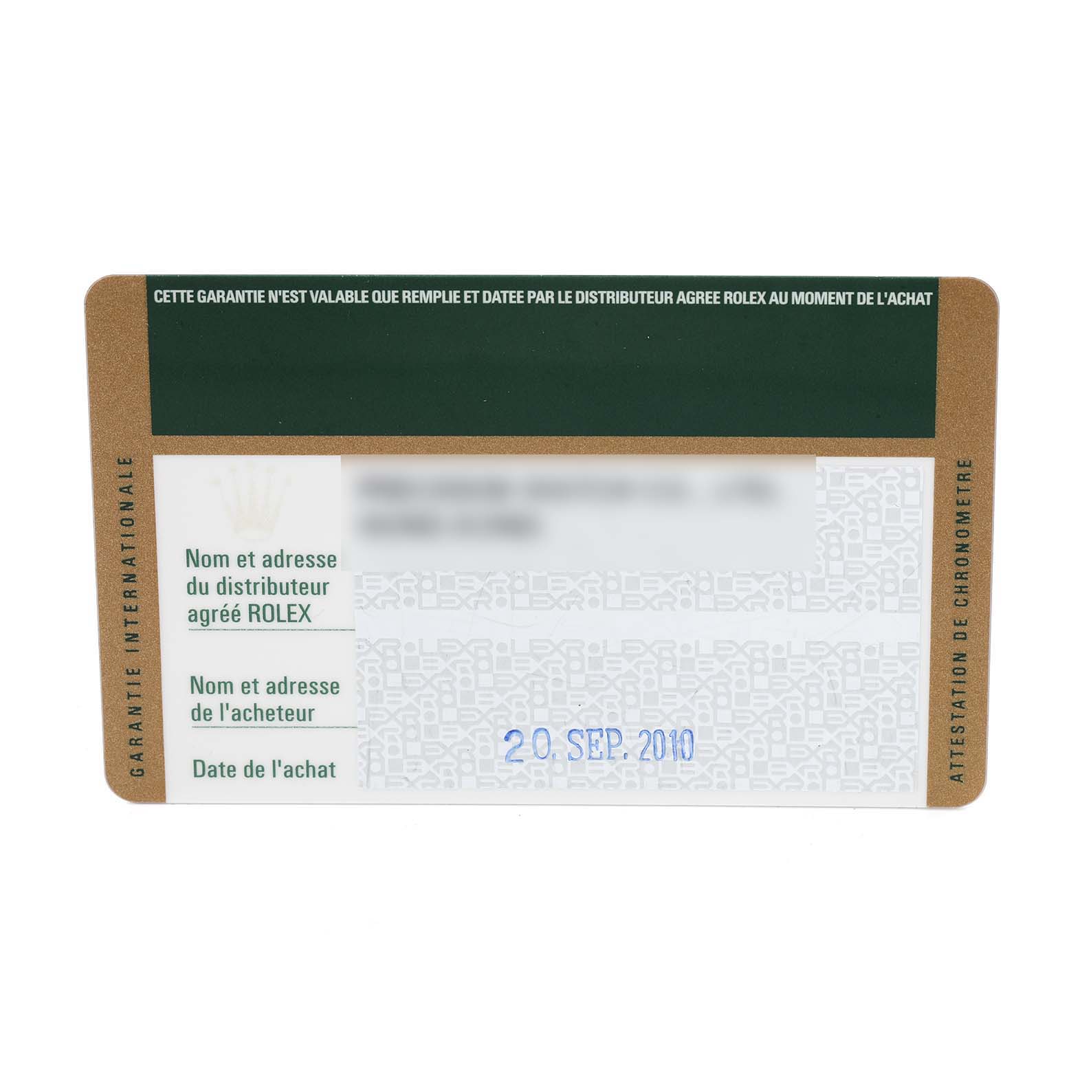 This image shows the guarantee card of a Rolex Datejust 179173 Women
s Steel and Gold (two tone) Champagne Dial 179173 Women
s Steel and Gold (two tone) Champagne Dial watch from a top-down angle.