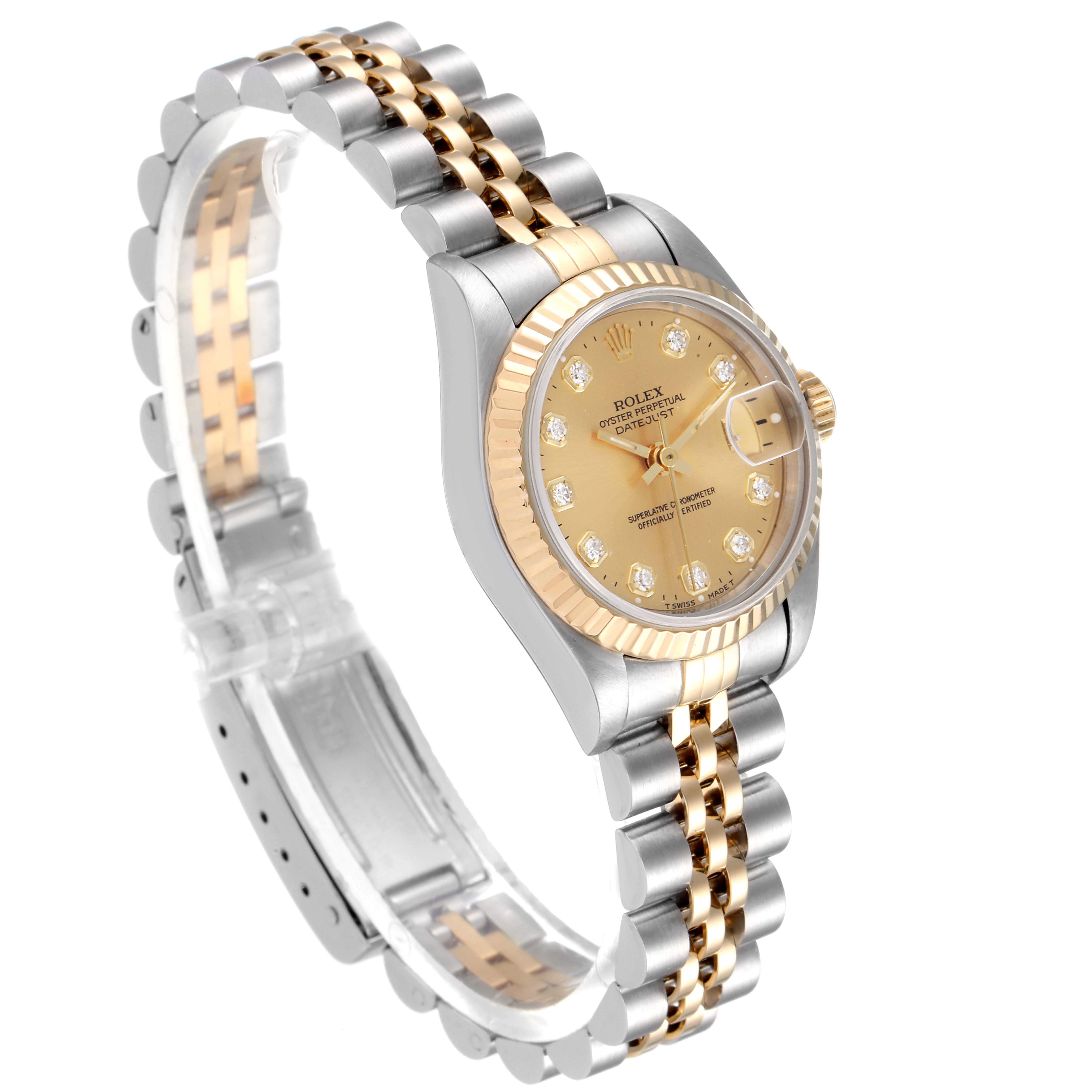 The image shows a Rolex Datejust 69173 Women
s Steel and Gold (two tone) Champagne Dial 69173 Women
s Steel and Gold (two tone) Champagne Dial watch at an angled side view, highlighting the face, bezel, and two-tone bracelet.
