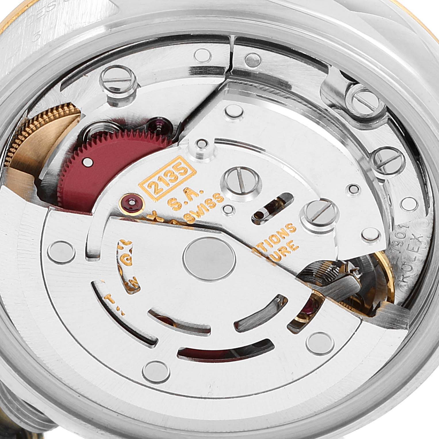 This is a close-up view of the movement and internal mechanism of the Rolex Datejust 69173 Women's Steel and Gold (two tone) White Dial 69173 Women's Steel and Gold (two tone) White Dial watch.