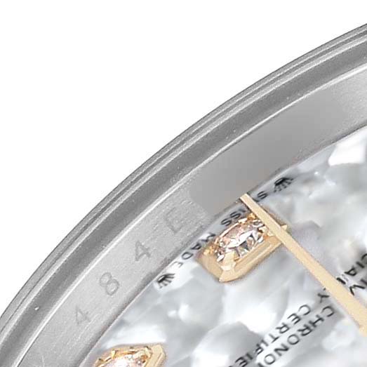 The image shows a close-up of the Rolex Datejust 279383 Women's Steel and Gold (two tone) Mother of Pearl Dial watch's dial edge, focusing on the bezel and diamond indices.