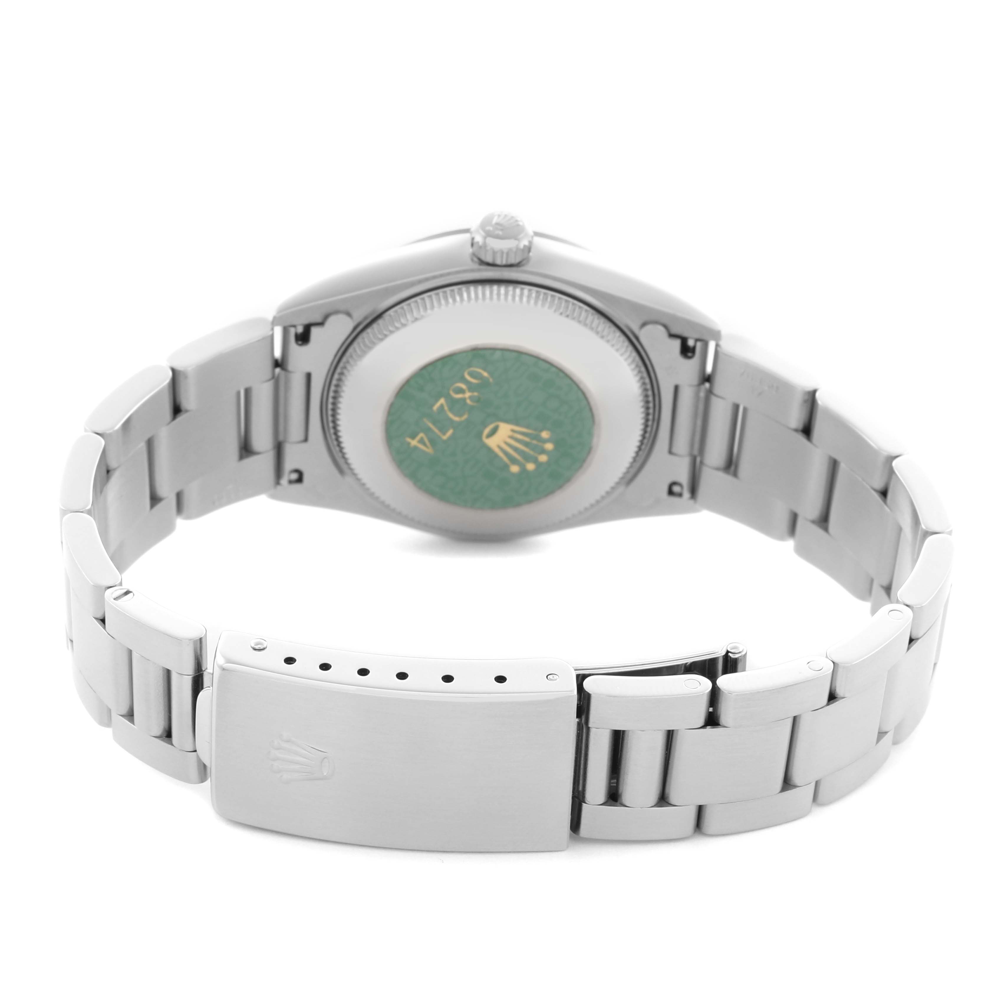 The image shows a rear view of a Rolex Mid-Size 68274 Women's Stainless Steel Black Dial 68274 Women's Stainless Steel Black Dial watch, focusing on the bracelet, clasp, and case back.