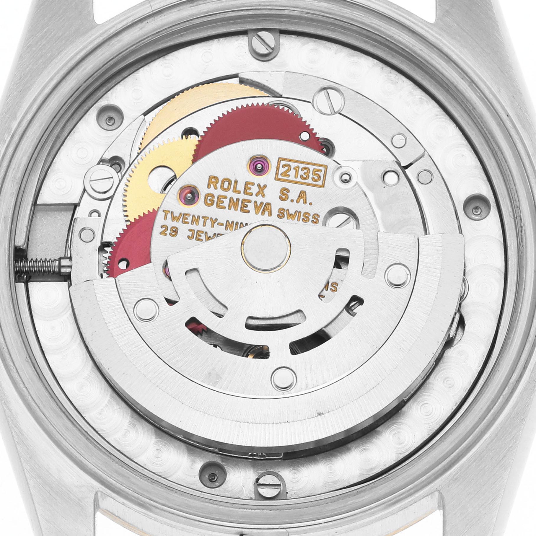 This image shows the movement of a Mid-Size Rolex watch, highlighting the rotor and gears from a top-down angle.