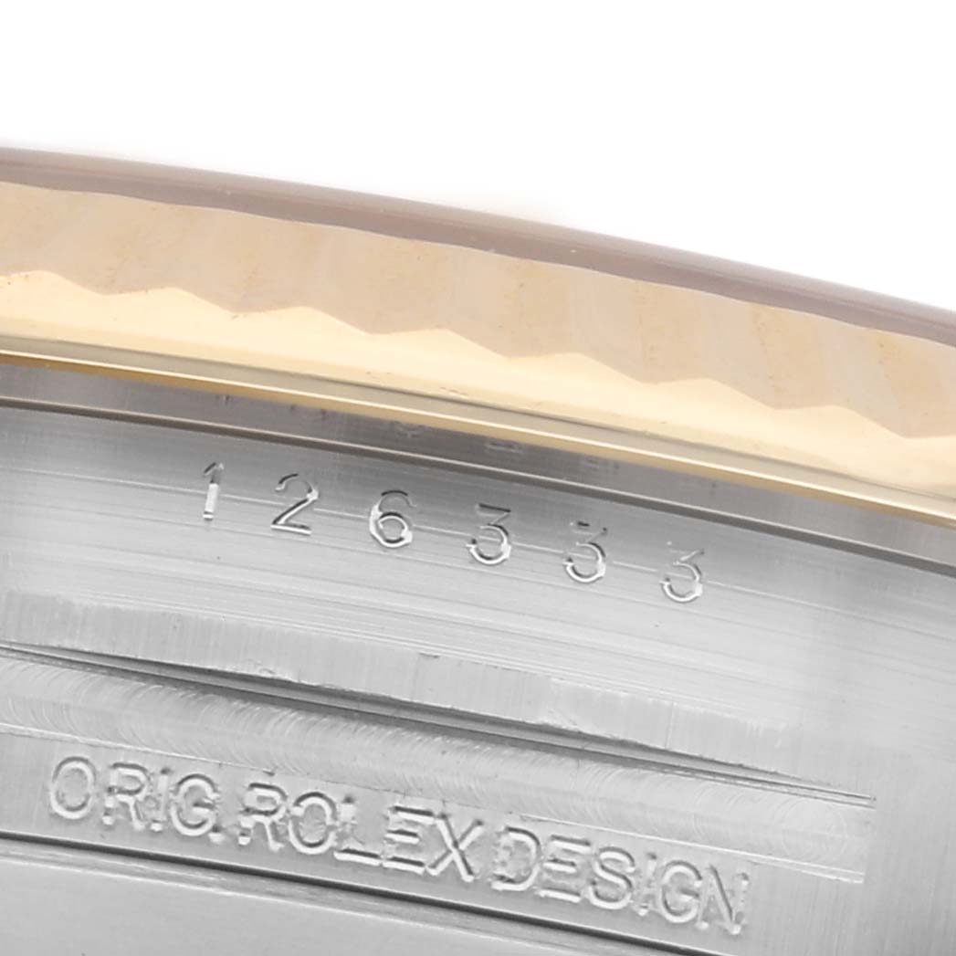 The image shows a close-up of the Rolex Datejust 41 126333 Men
s Steel and Gold (two tone) Silver Dial 126333 Men
s Steel and Gold (two tone) Silver Dial
s inner bezel with engraved model number and "ORIG ROLEX DESIGN."