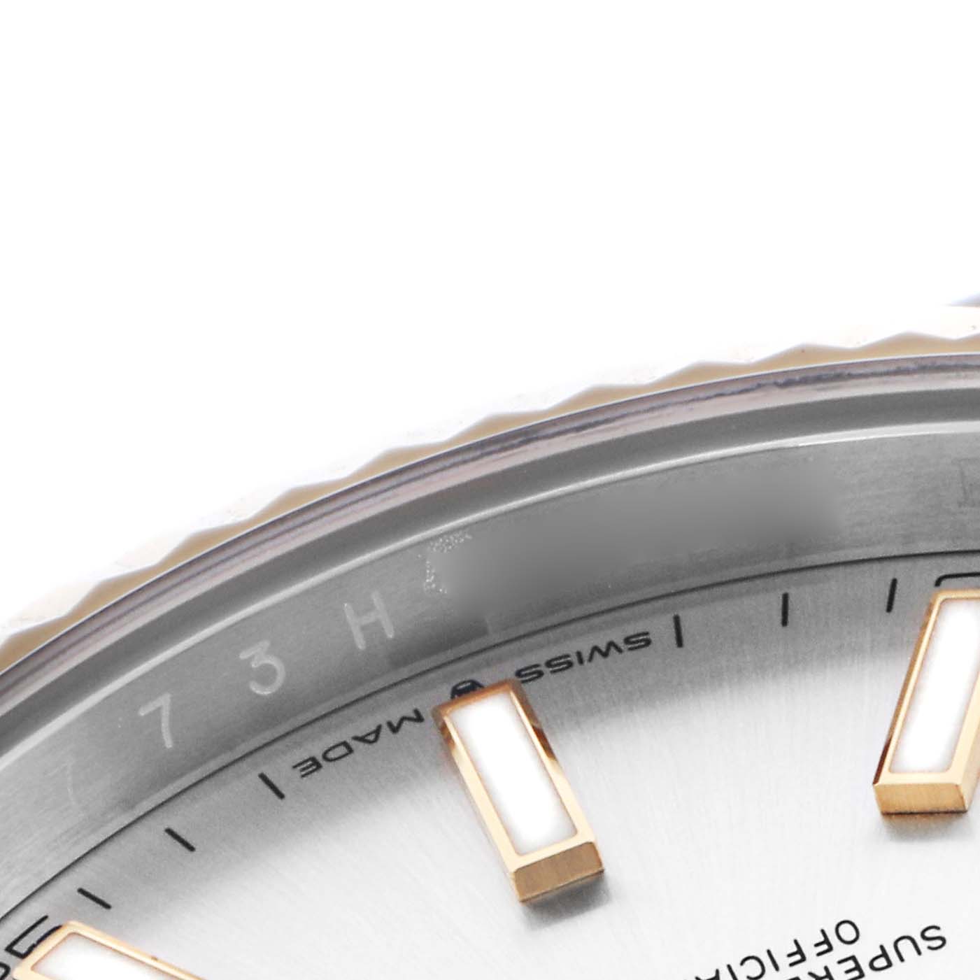 The image shows a close-up of the dial and part of the bezel of a Rolex Datejust 41 126333 Men
s Steel and Gold (two tone) Silver Dial 126333 Men
s Steel and Gold (two tone) Silver Dial watch.