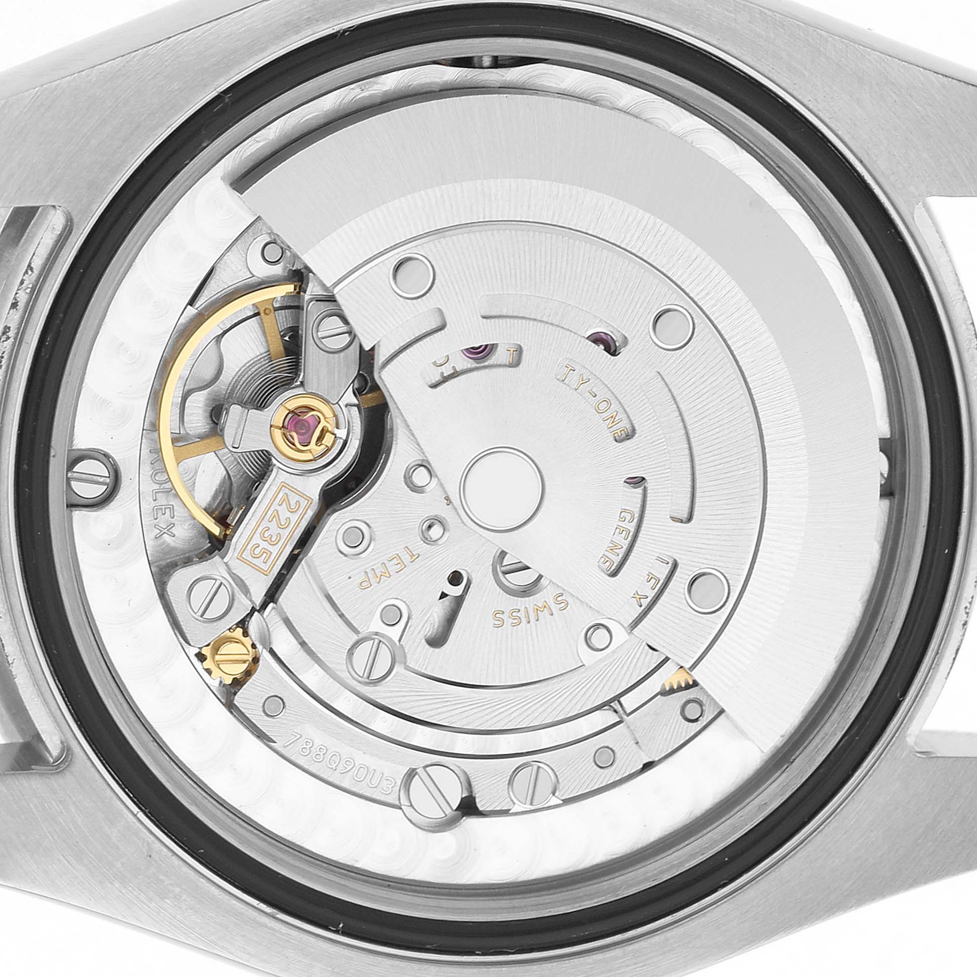 The image shows the movement of a Rolex Datejust 178384 Women's Stainless Steel Pink Dial watch from the back, highlighting the internal mechanics.