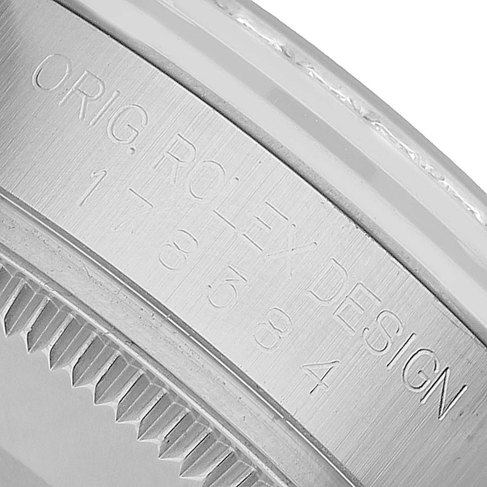 The image shows a close-up of the Rolex Datejust 178384 Women's Stainless Steel Pink Dial case edge with "Orig. Rolex Design" engraving.
