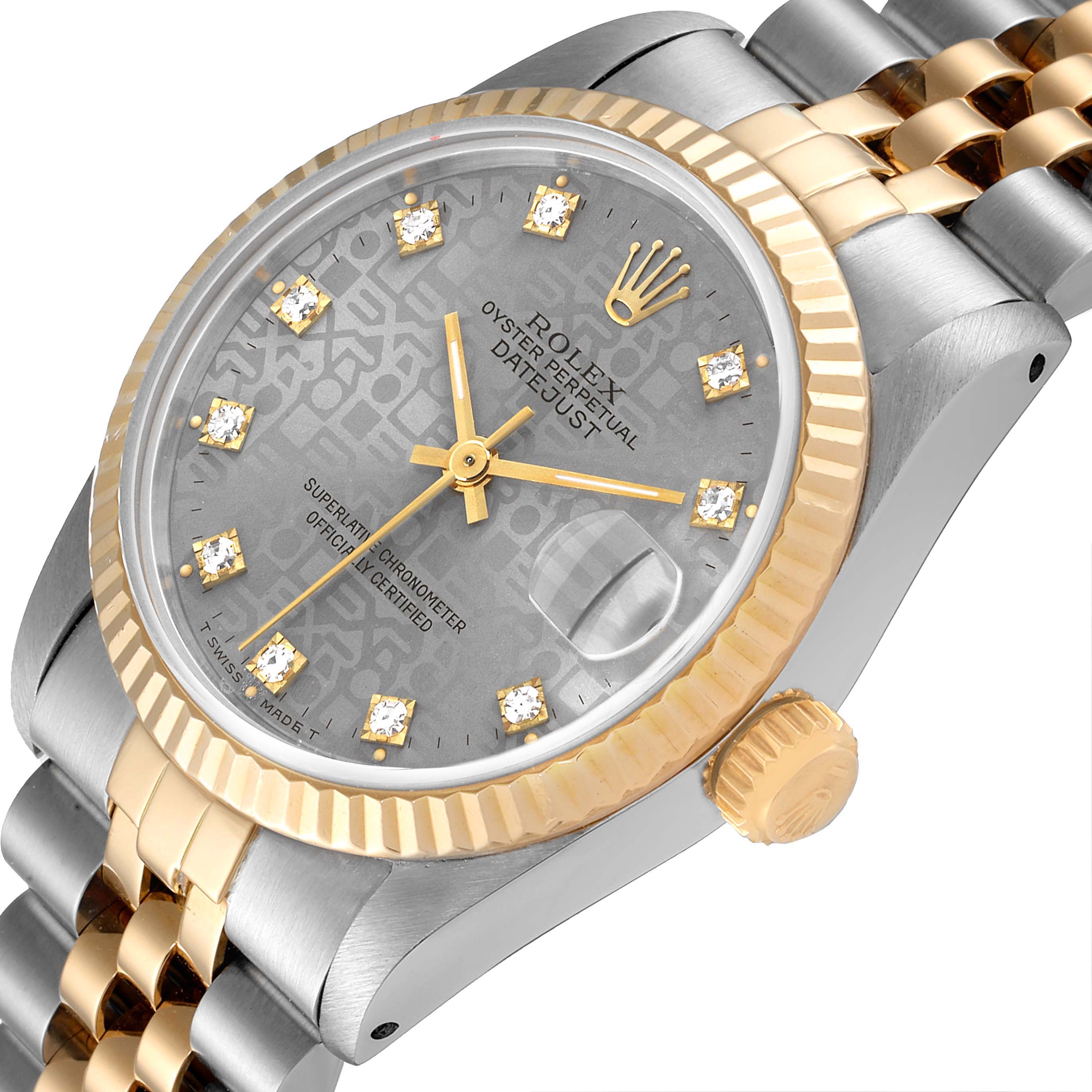 The image shows a close-up angle of a Rolex Mid-Size 68273 Women's Steel and Gold (two tone) Grey Dial 68273 Women's Steel and Gold (two tone) Grey Dial Datejust watch displaying the face, crown, and part of the bracelet.