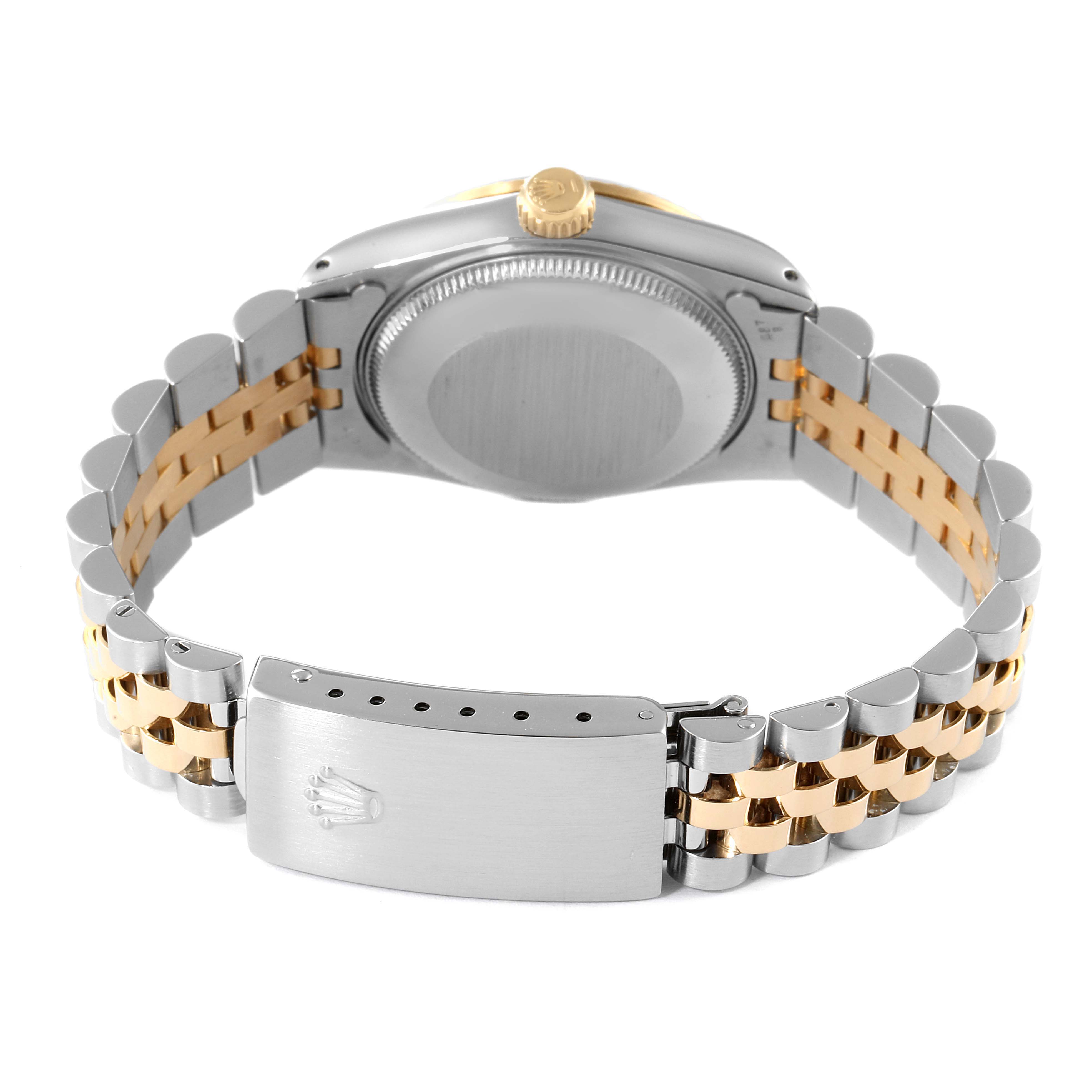 This image shows the back case and the bracelet clasp of a Mid-Size Rolex watch.