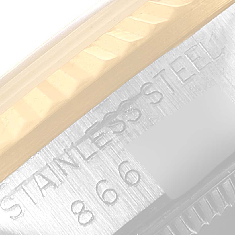 This close-up image shows the side view of the stainless steel casing with visible engraving of the Rolex Mid-Size 68273 Women's Steel and Gold (two tone) Grey Dial 68273 Women's Steel and Gold (two tone) Grey Dial model watch.