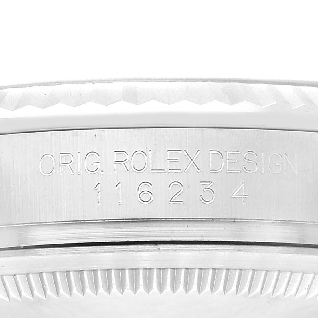 The image shows the side and part of the bezel of a Rolex Datejust 116234 Men's Stainless Steel Black Dial 116234 Men's Stainless Steel Black Dial, featuring the engraved model number 116234.