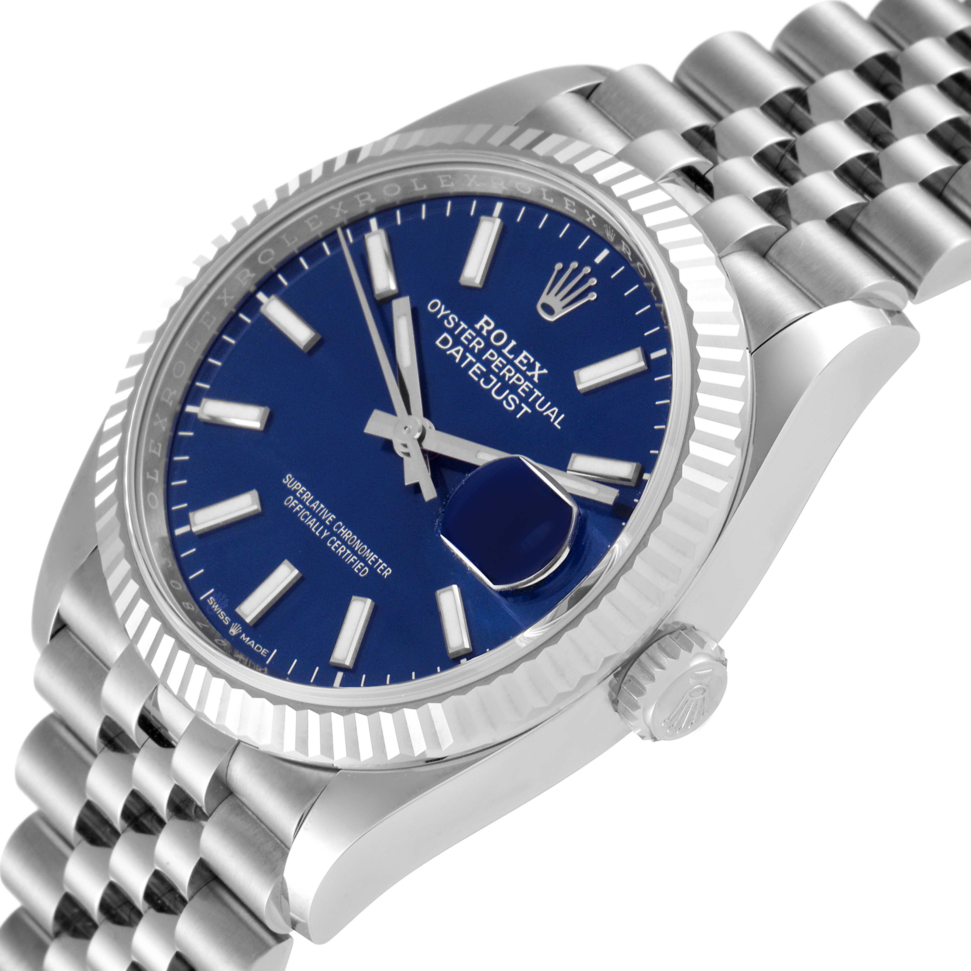 The image shows a Rolex Datejust 126234 Men's Stainless Steel Blue Dial 126234 Men's Stainless Steel Blue Dial watch with a partial view focusing on the face, bezel, and bracelet at a slight angle.