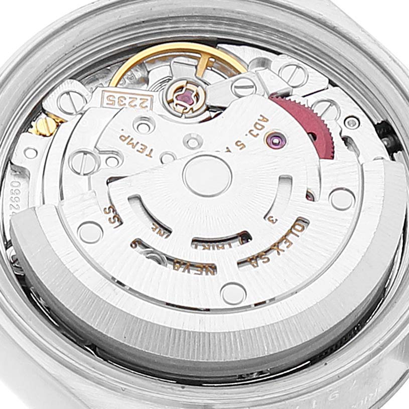 This image shows a close-up of the movement mechanism inside a Rolex Datejust 79174 Women
s Stainless Steel Silver Dial 79174 Women
s Stainless Steel Silver Dial watch.