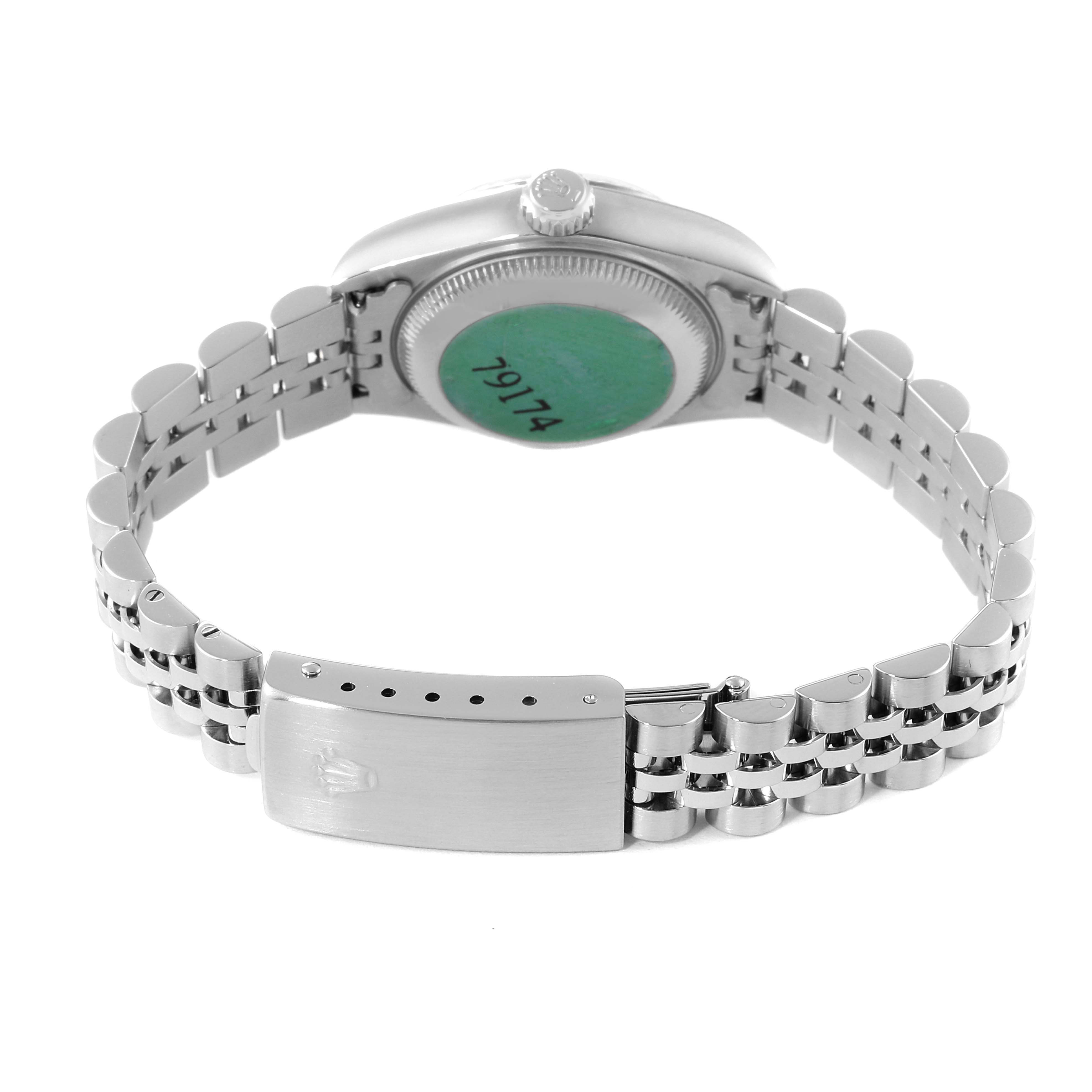 This image shows the back view of a Rolex Datejust 79174 Women
s Stainless Steel Silver Dial 79174 Women
s Stainless Steel Silver Dial watch, highlighting the case back, crown, and the metal bracelet with clasp.