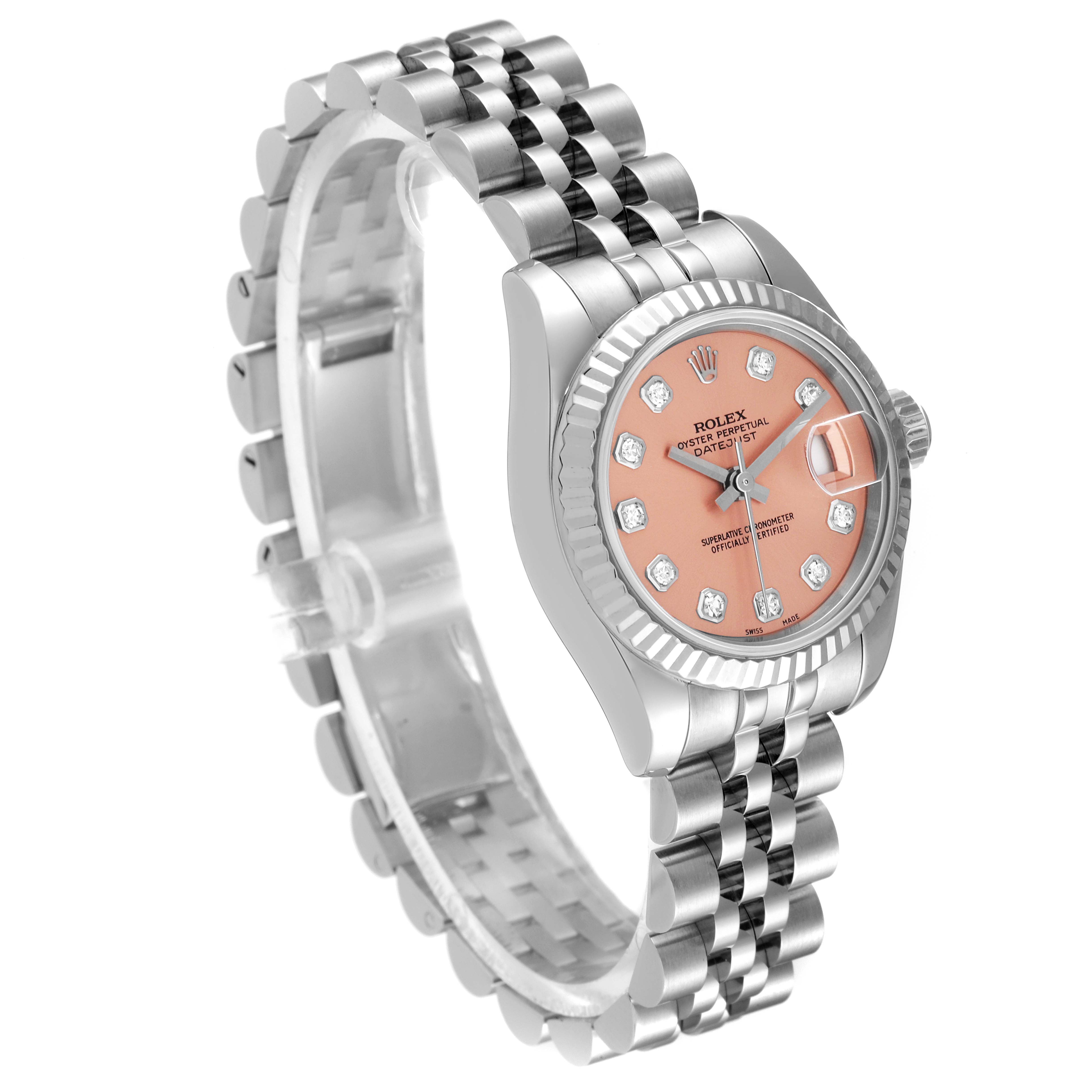 The Rolex Datejust 179174 Women's Stainless Steel Pink Dial 179174 Women's Stainless Steel Pink Dial watch is shown at an angled side view, highlighting its pink dial, fluted bezel, and Jubilee bracelet.