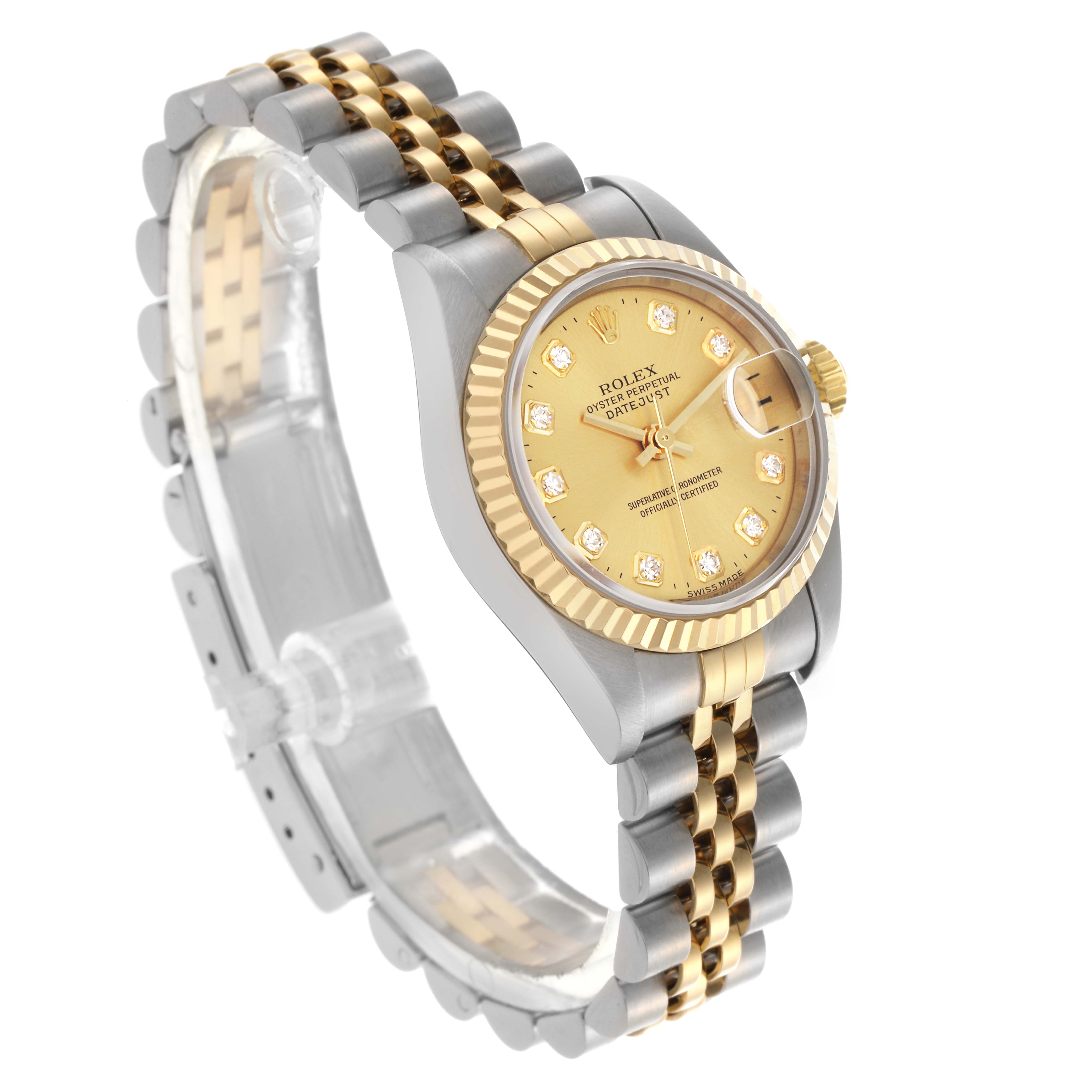 The image shows a Rolex Datejust 79173 Women's Steel and Gold (two tone) Champagne Dial 79173 Women's Steel and Gold (two tone) Champagne Dial watch at a three-quarter angle, highlighting the gold dial, fluted bezel, and two-tone bracelet.