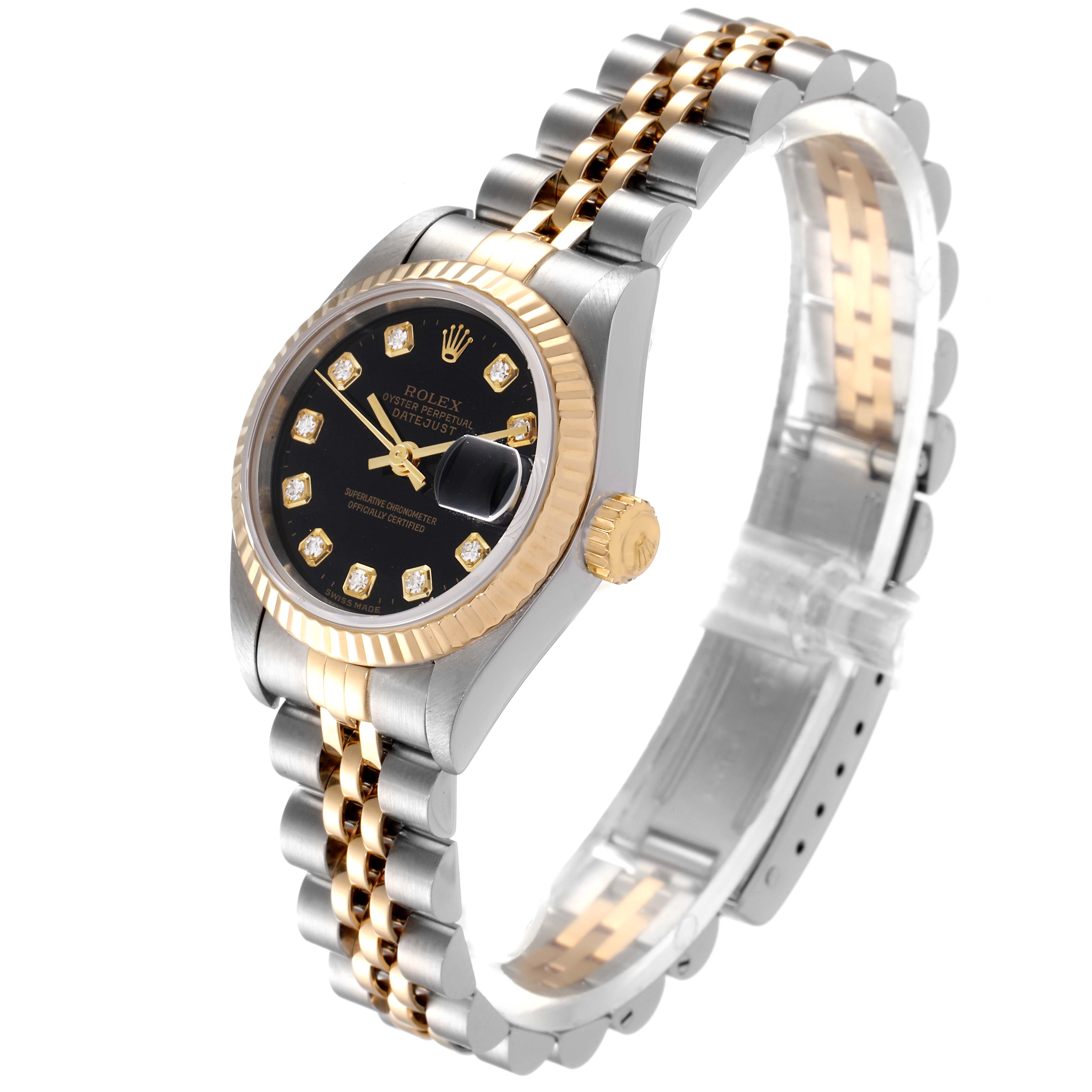 The Rolex Datejust 79173 Women
s Steel and Gold (two tone) Black Dial 79173 Women
s Steel and Gold (two tone) Black Dial model is shown at a slightly angled side view, highlighting the face, crown, fluted bezel, and two-tone Jubilee bracelet.