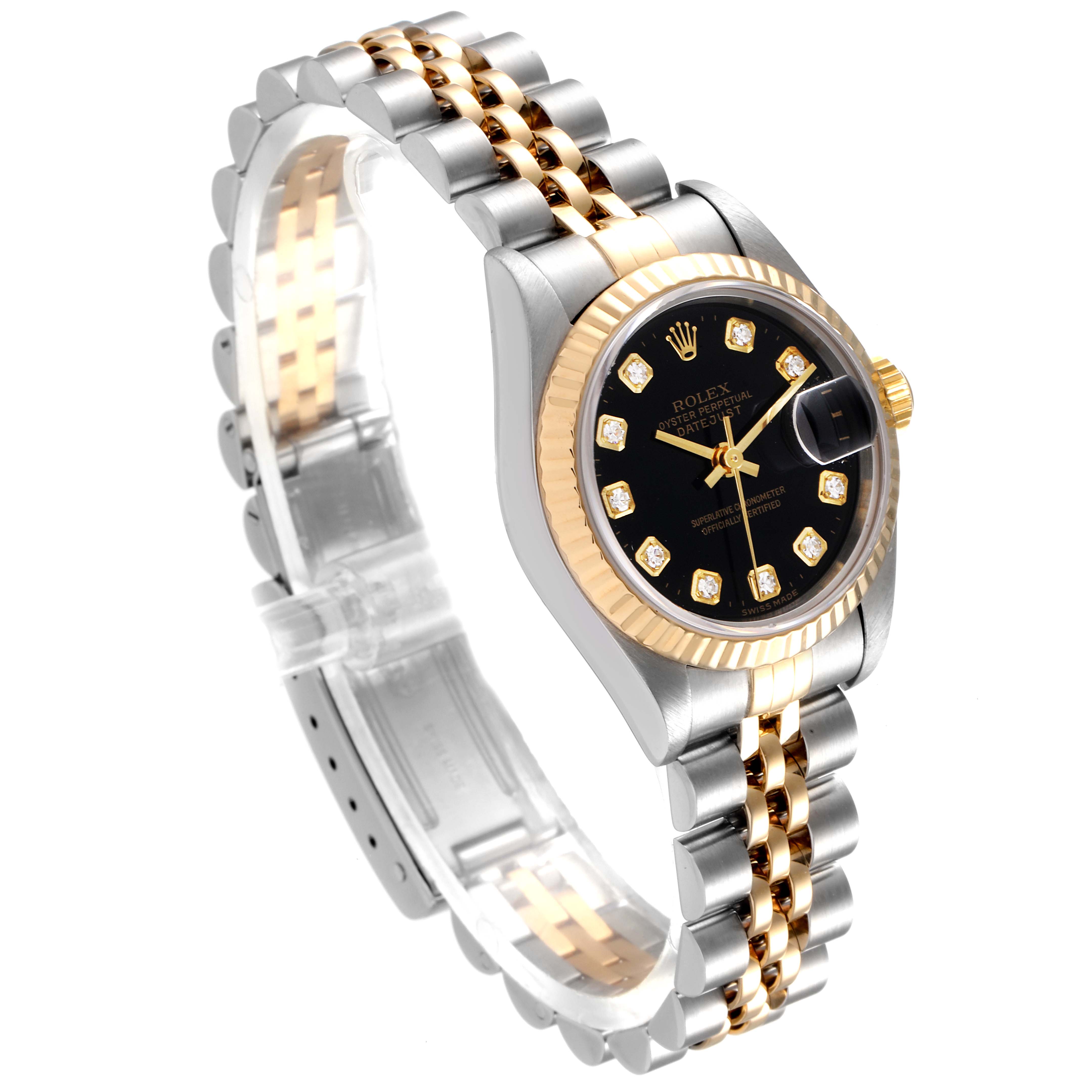 This image shows a Rolex Datejust 79173 Women
s Steel and Gold (two tone) Black Dial 79173 Women
s Steel and Gold (two tone) Black Dial watch at an angle displaying the face, bezel, crown, and part of the bracelet.