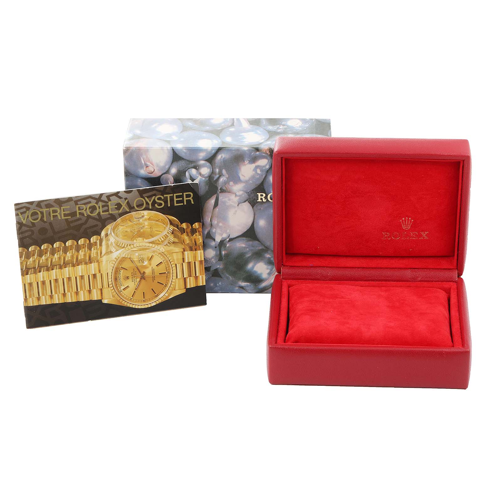 The image shows the packaging and manual for a Rolex Datejust 69173 Women
s Steel and Gold (two tone) Champagne Dial 69173 Women
s Steel and Gold (two tone) Champagne Dial watch, including a red box and booklet.