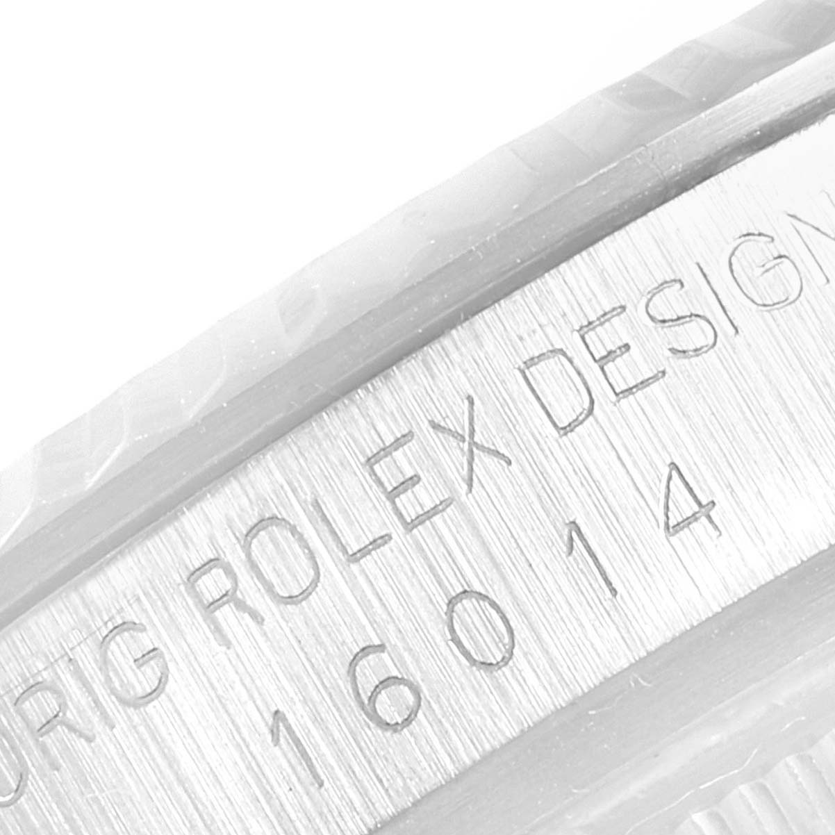 The image shows a close-up angle of the engraved case side of the Rolex Vintage Collection 16014 Men's Stainless Steel Blue Dial 16014 Men's Stainless Steel Blue Dial model.