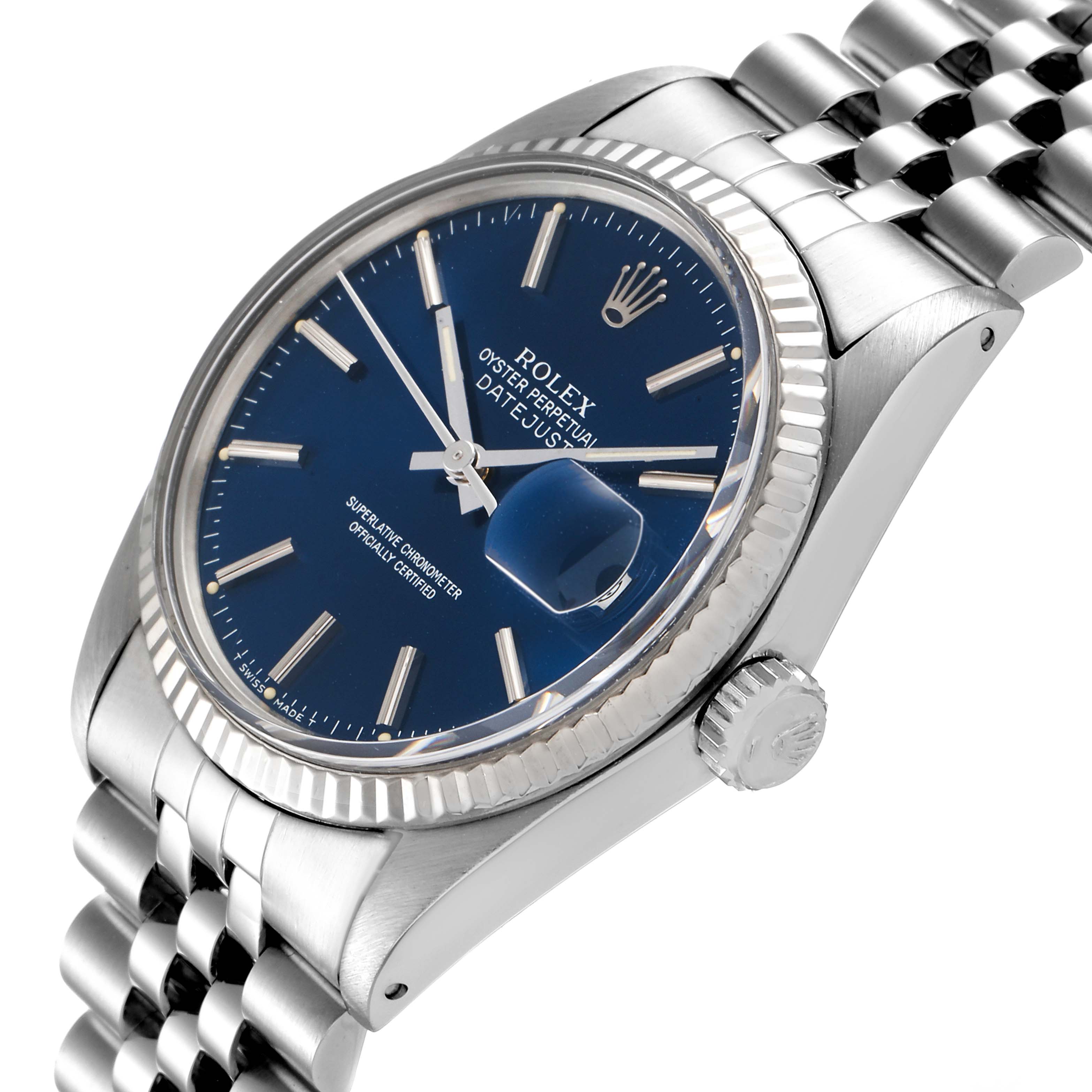 This angled view of the Rolex Vintage Collection 16014 Men's Stainless Steel Blue Dial 16014 Men's Stainless Steel Blue Dial watch shows the face, bezel, crown, and part of the Jubilee bracelet.