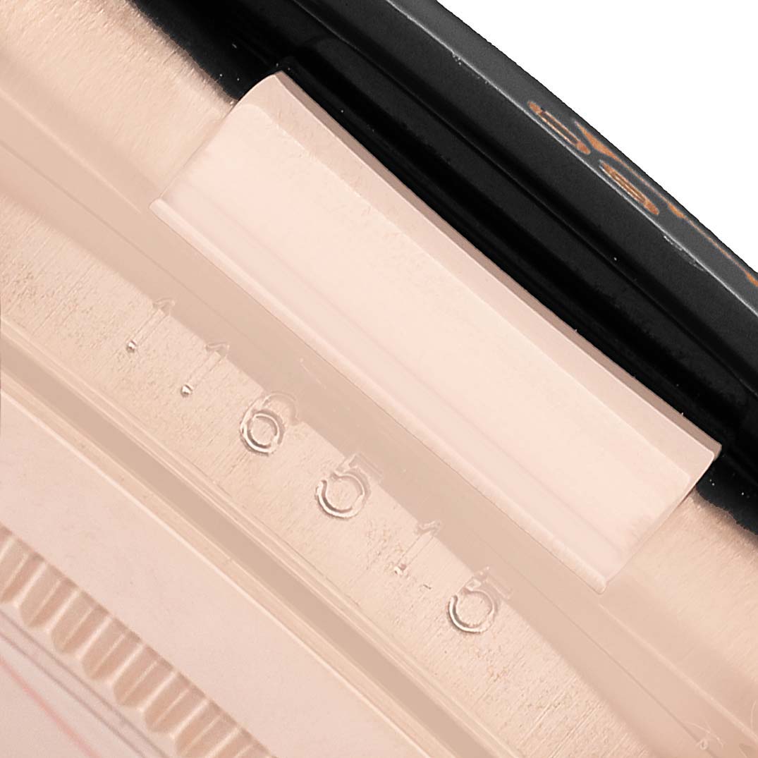 The image shows a close-up of the case's side of a Rolex Daytona 116515LN Men's Rose Gold Black Dial, highlighting the engraved model number.