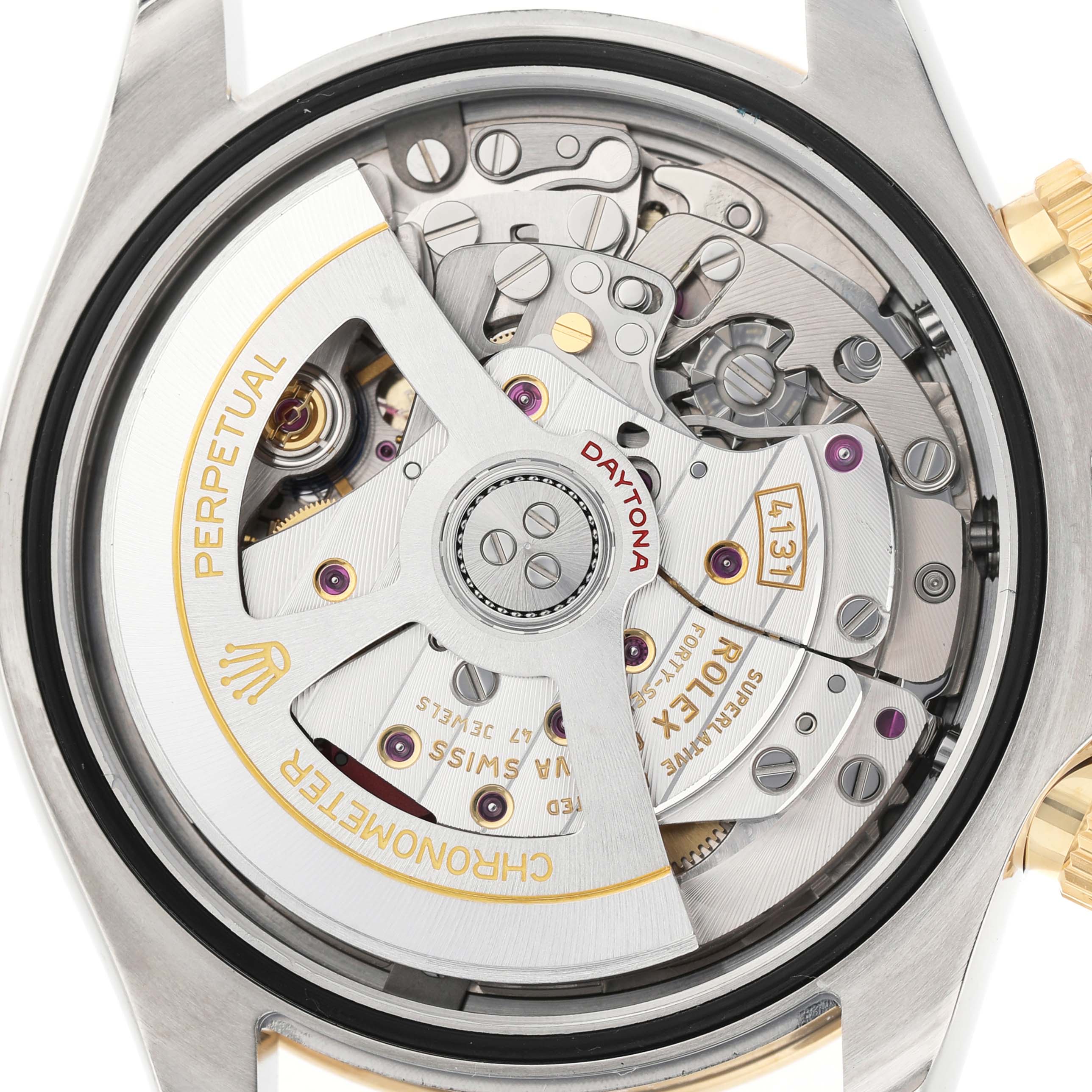 The image shows the Rolex Daytona 126503 Men's Steel and Gold (two tone) Champagne Dial watch from a back view, highlighting its intricate movement mechanism.