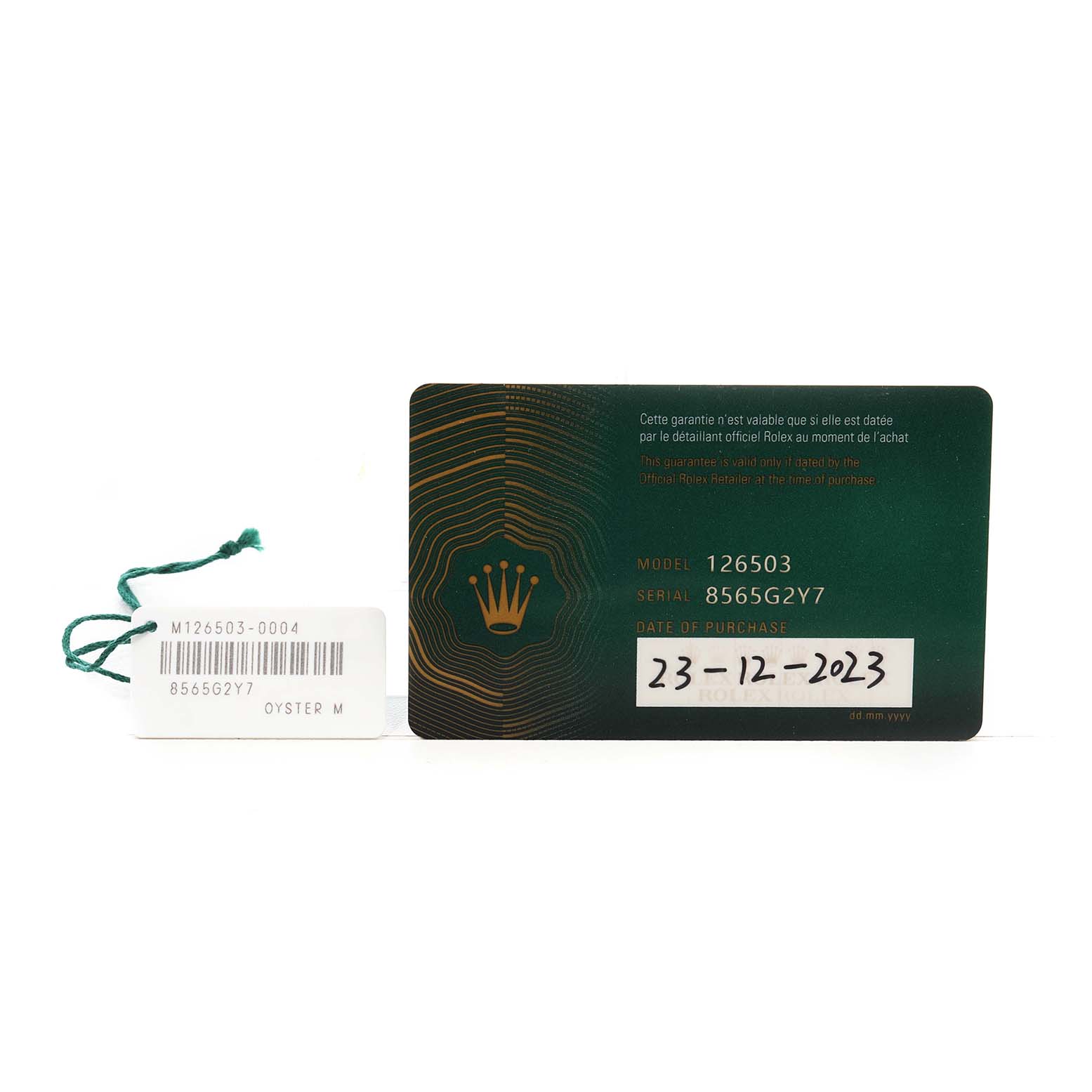 The image shows a warranty card and tag for a Rolex Daytona 126503 Men's Steel and Gold (two tone) Champagne Dial, model number 126503.