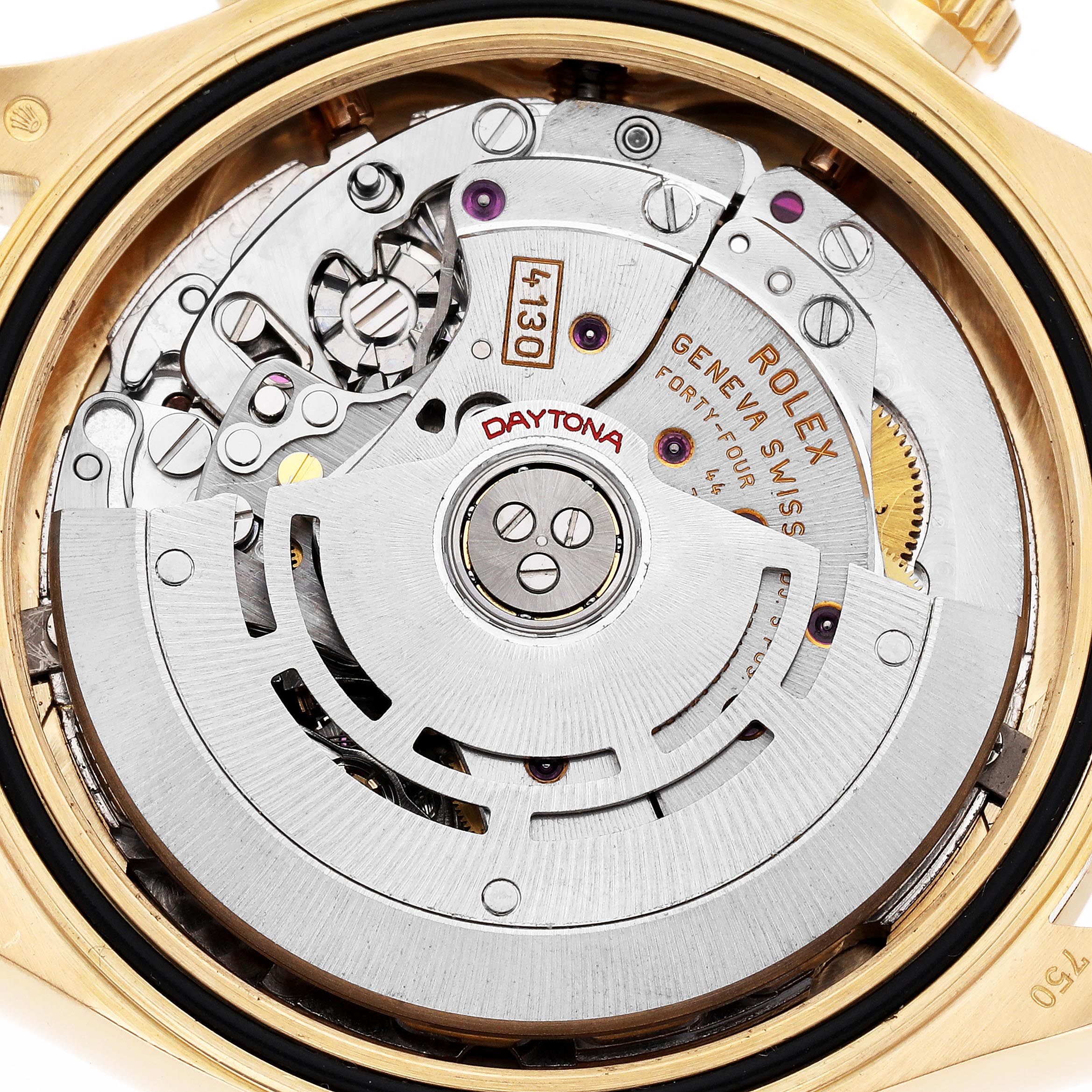 The image shows the intricate movement and rotor of a Rolex Daytona 116518 Men
s Yellow Gold Mother of Pearl Dial 116518 Men
s Yellow Gold Mother of Pearl Dial watch from a rear angle.