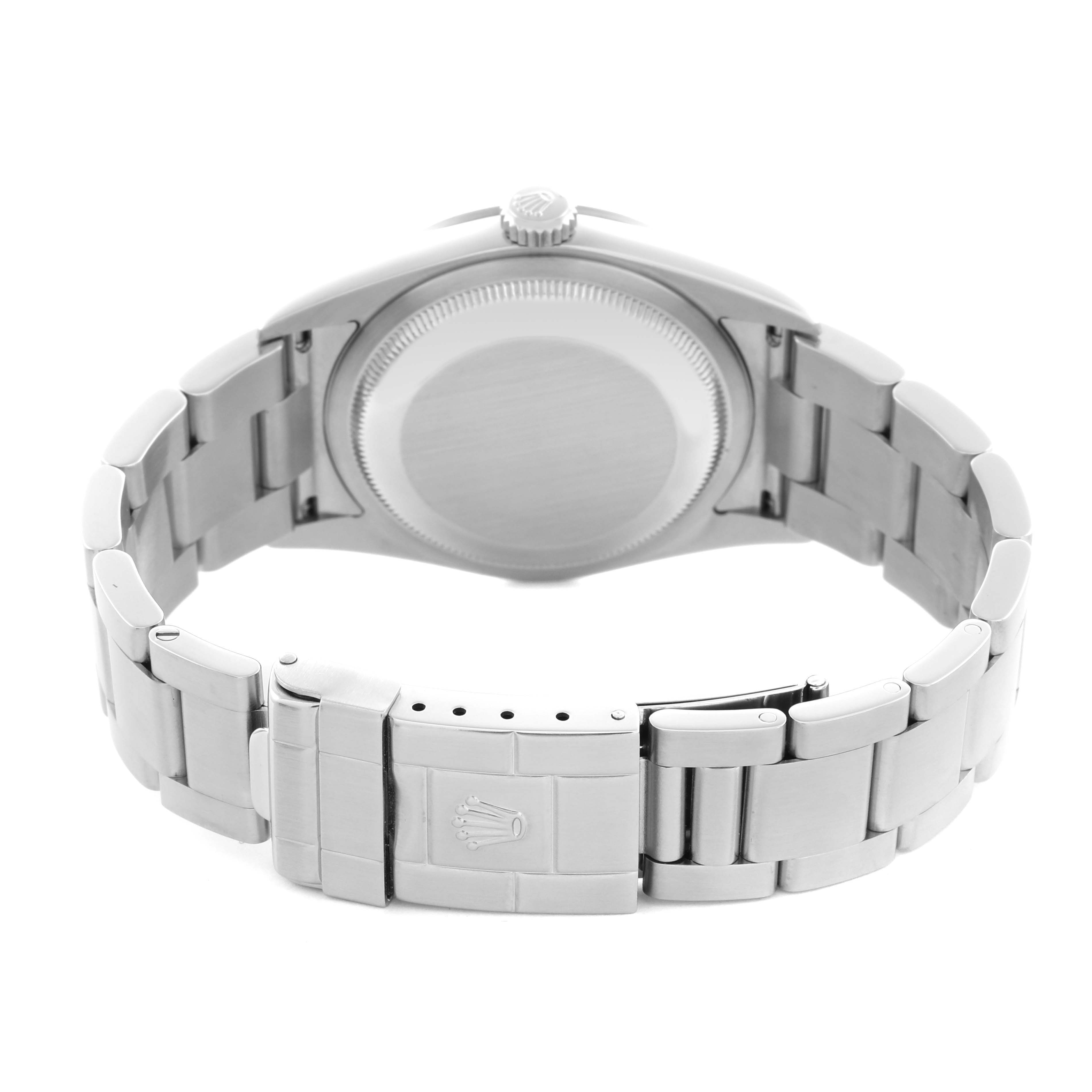 The image shows the back of a Rolex Explorer 114270 Men
s Stainless Steel Black Dial 114270 Men
s Stainless Steel Black Dial watch, highlighting the case back, crown, and bracelet clasp.