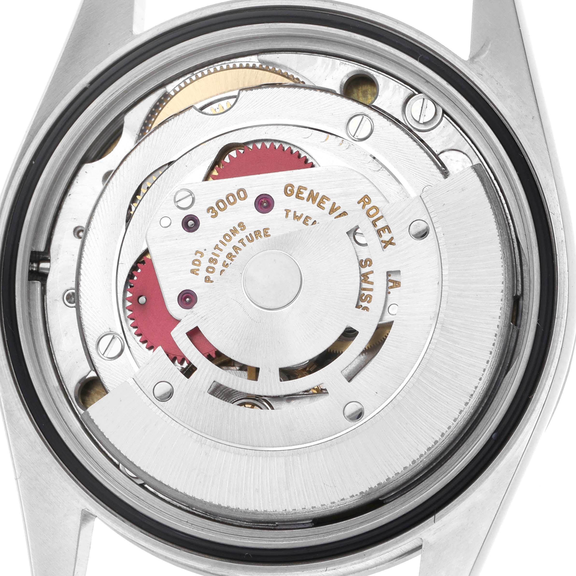 The image shows the back view of a Rolex Explorer 14270 Men
s Stainless Steel Black Dial 14270 Men
s Stainless Steel Black Dial watch, displaying its internal mechanical movement.