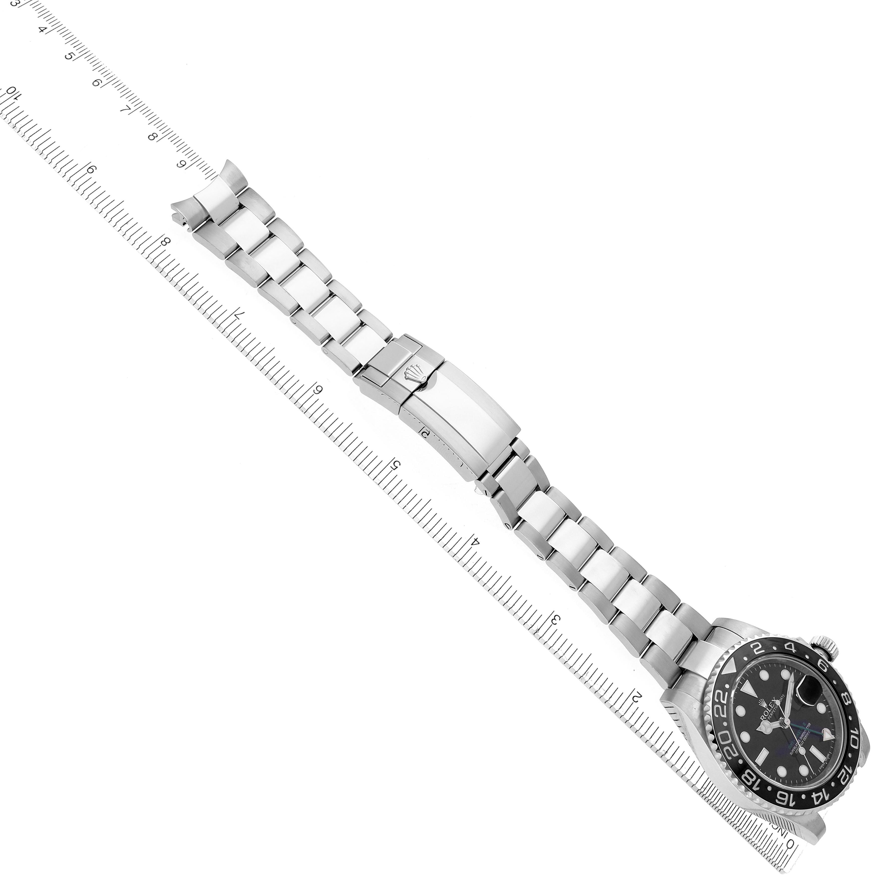 The Rolex GMT-Master 116710 Men's Stainless Steel Black Dial 116710 Men's Stainless Steel Black Dial watch is shown flat from an overhead angle, highlighting the face, bezel, bracelet, and clasp.