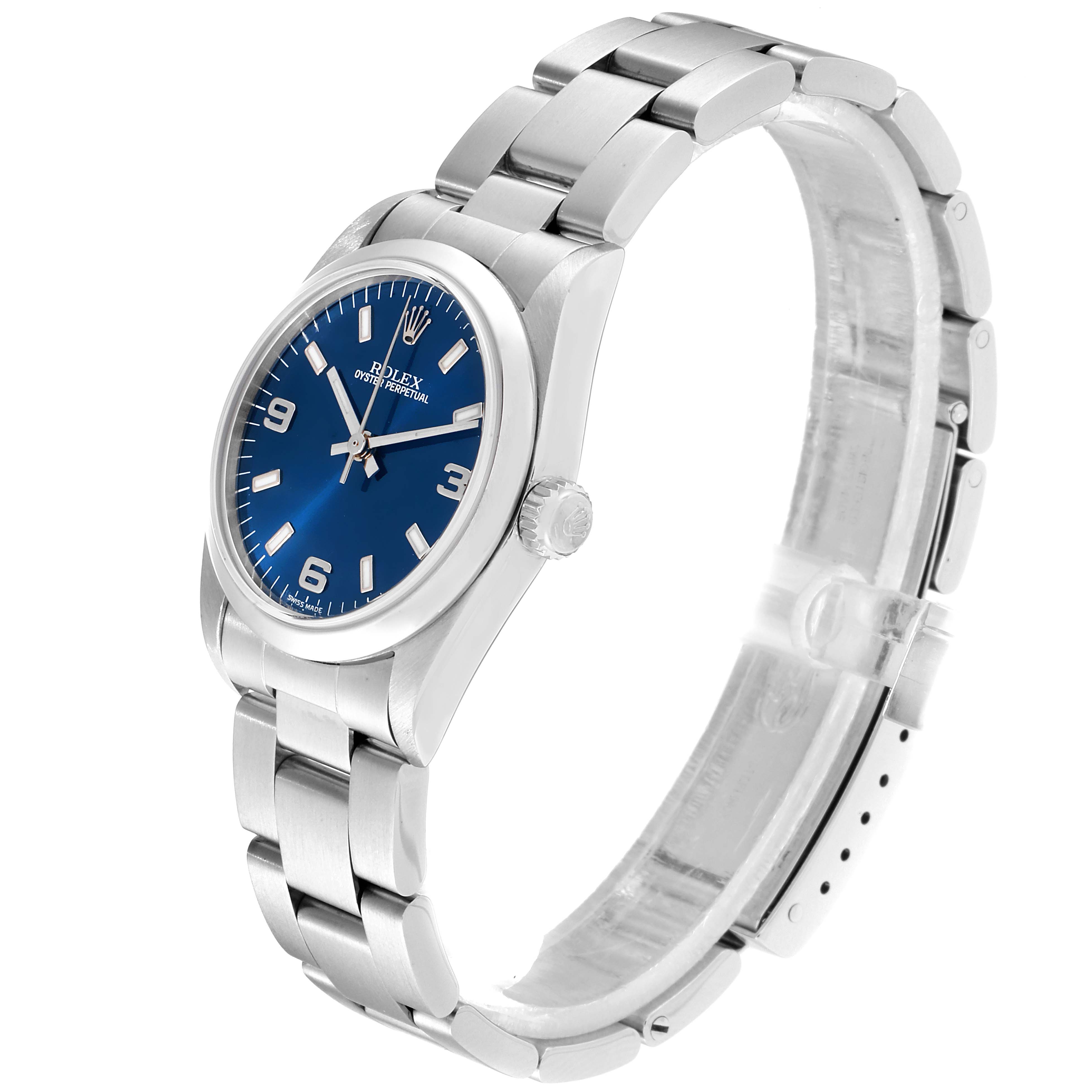 The image shows a Rolex Mid-Size 77080 Women
s Stainless Steel Blue Dial 77080 Women
s Stainless Steel Blue Dial model watch at a three-quarter angle, highlighting its face, dial, crown, and bracelet.