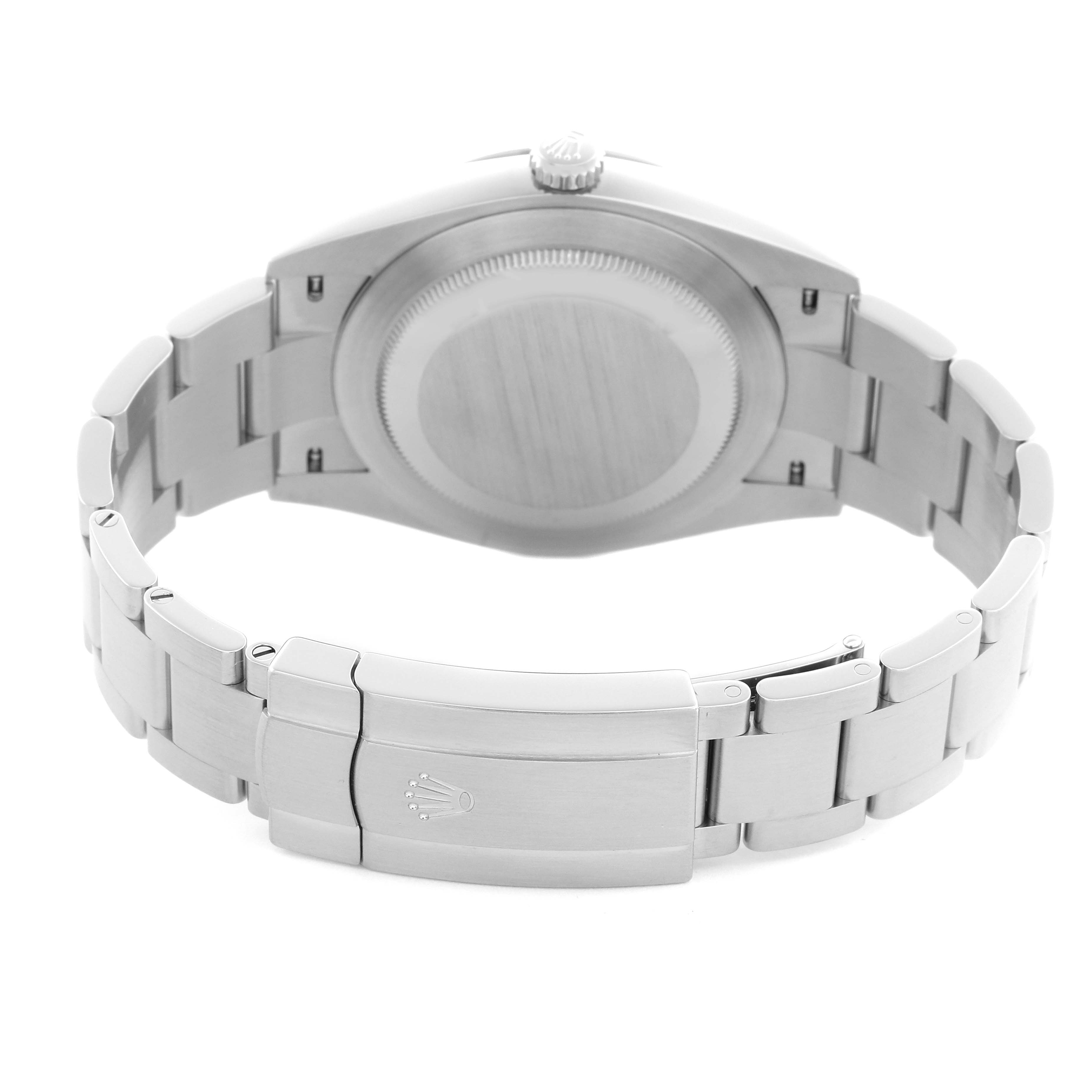 The image shows the back of a Rolex Oyster Perpetual 124300 Men
s Stainless Steel Blue Dial 124300 Men
s Stainless Steel Blue Dial, focusing on the case back and bracelet clasp.