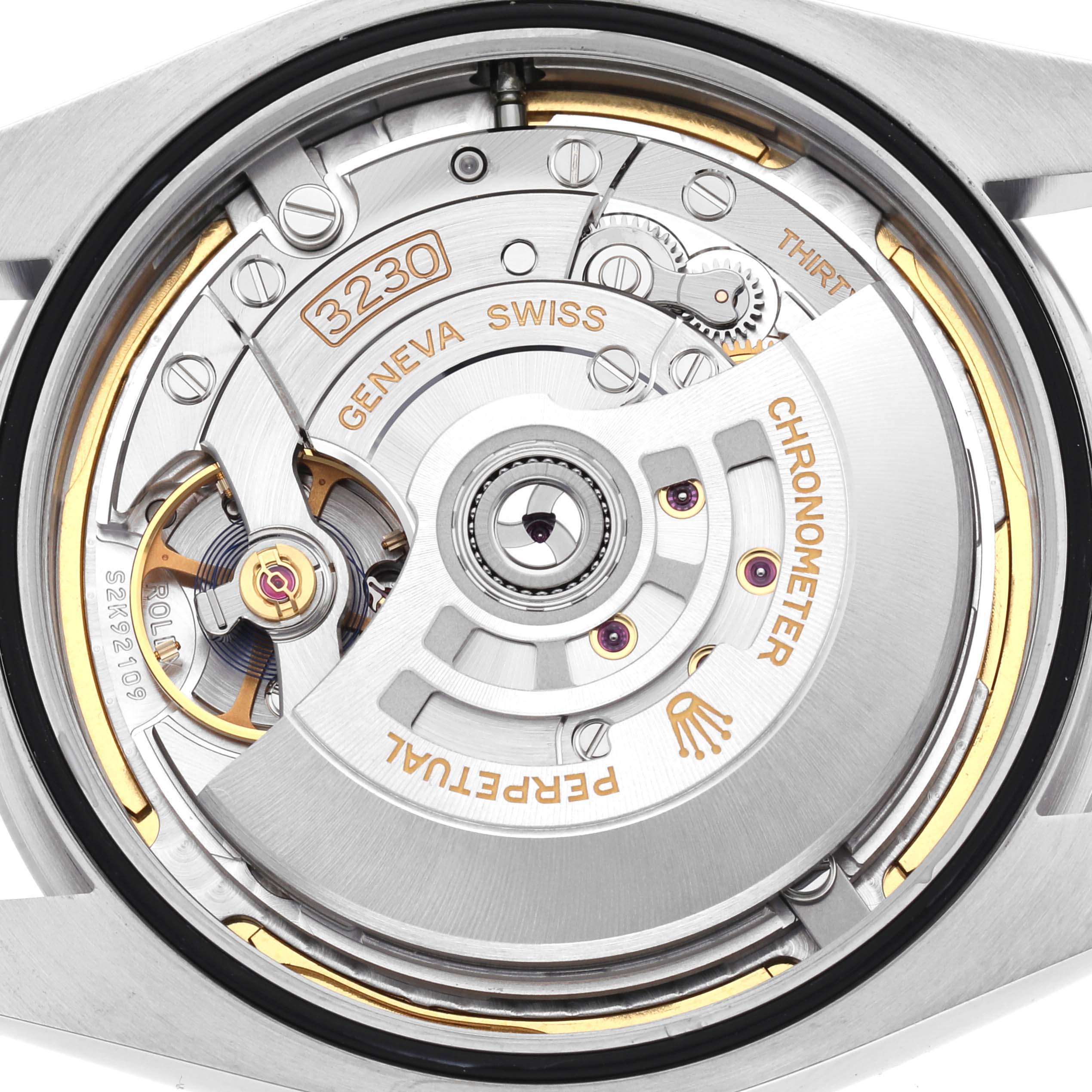 The image shows the back view of the Rolex Oyster Perpetual 124300 Men
s Stainless Steel Blue Dial 124300 Men
s Stainless Steel Blue Dial watch, focusing on the intricate movement details.