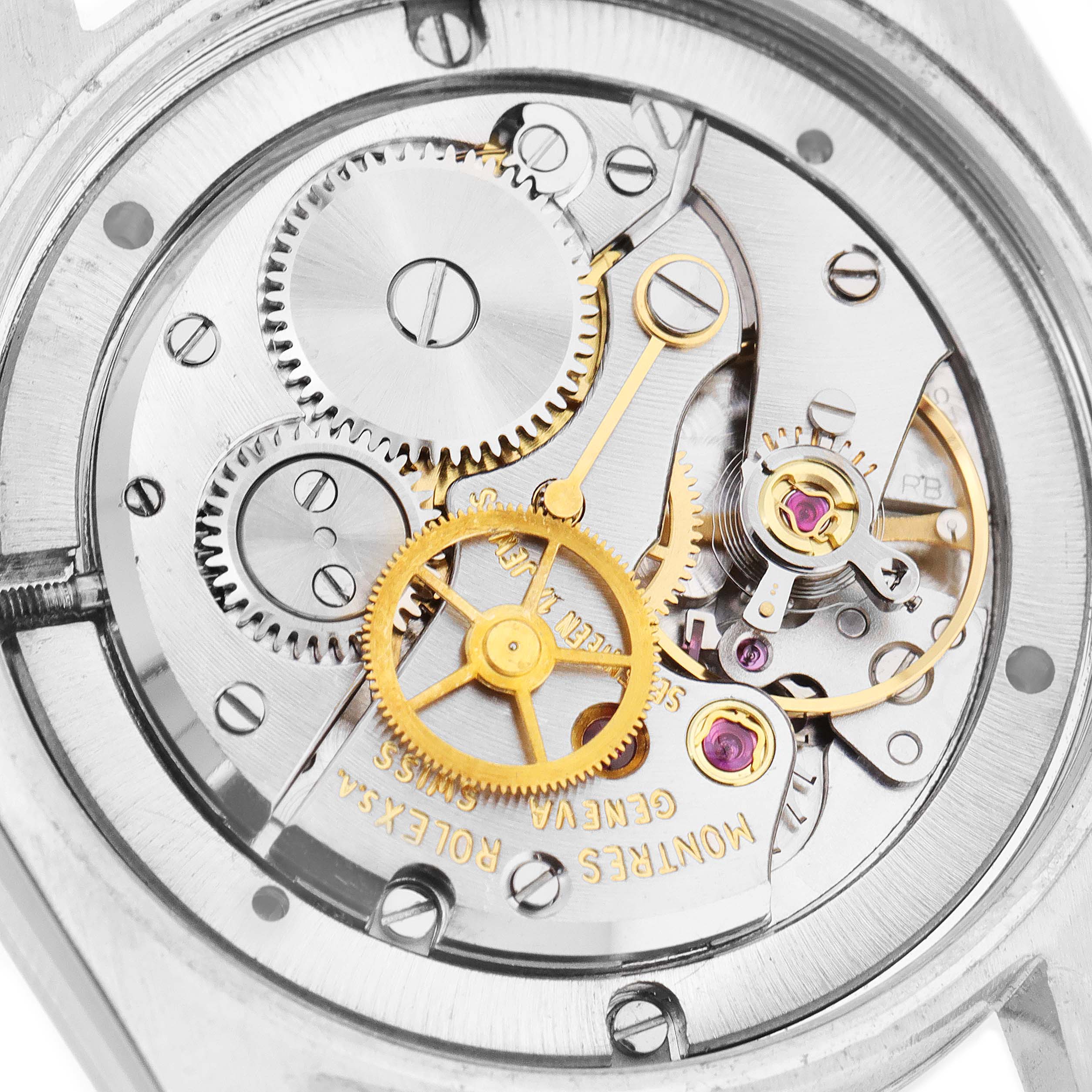 This image showcases the intricate internal movement mechanism of a Vintage Collection Rolex watch from a top-down angle.