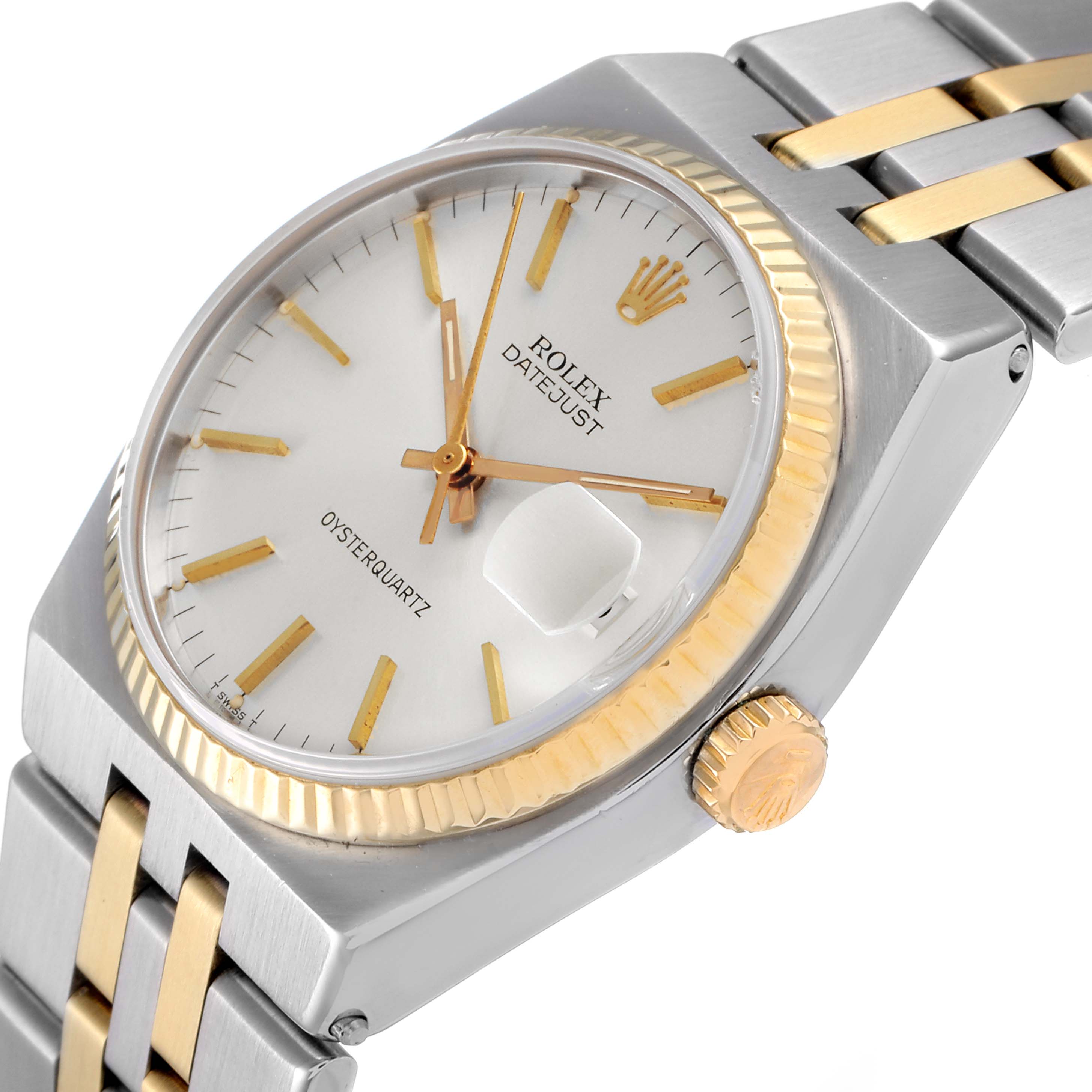 The Rolex Oysterquartz 17013 Men
s Steel and Gold (two tone) Silver Dial 17013 Men
s Steel and Gold (two tone) Silver Dial watch is shown at an angle displaying the dial, bezel, crown, and part of the two-tone bracelet.