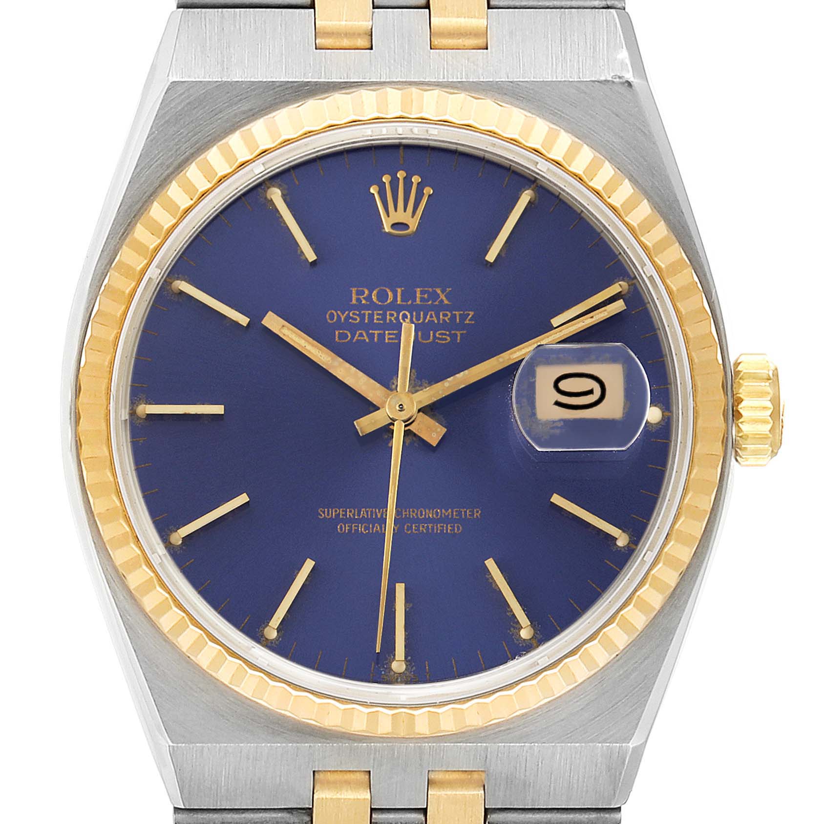 This image shows a front view of a Rolex Oysterquartz 17013 Men's Steel and Gold (two tone) Blue Dial 17013 Men's Steel and Gold (two tone) Blue Dial Datejust watch with a blue dial, gold bezel, and metal band.