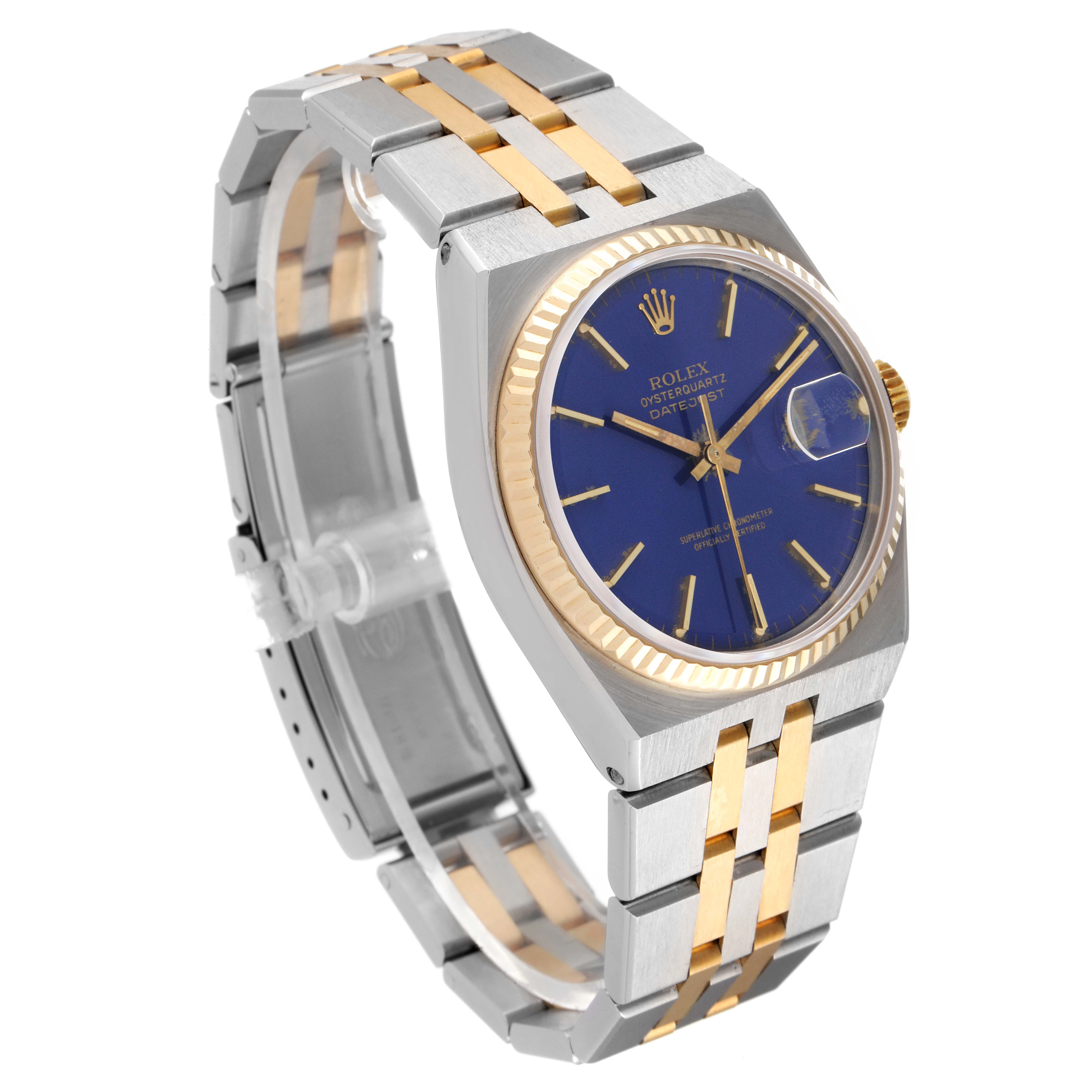 The Rolex Oysterquartz 17013 Men's Steel and Gold (two tone) Blue Dial 17013 Men's Steel and Gold (two tone) Blue Dial watch is shown at a three-quarter angle, highlighting the blue dial, bezel, and two-tone metal bracelet.