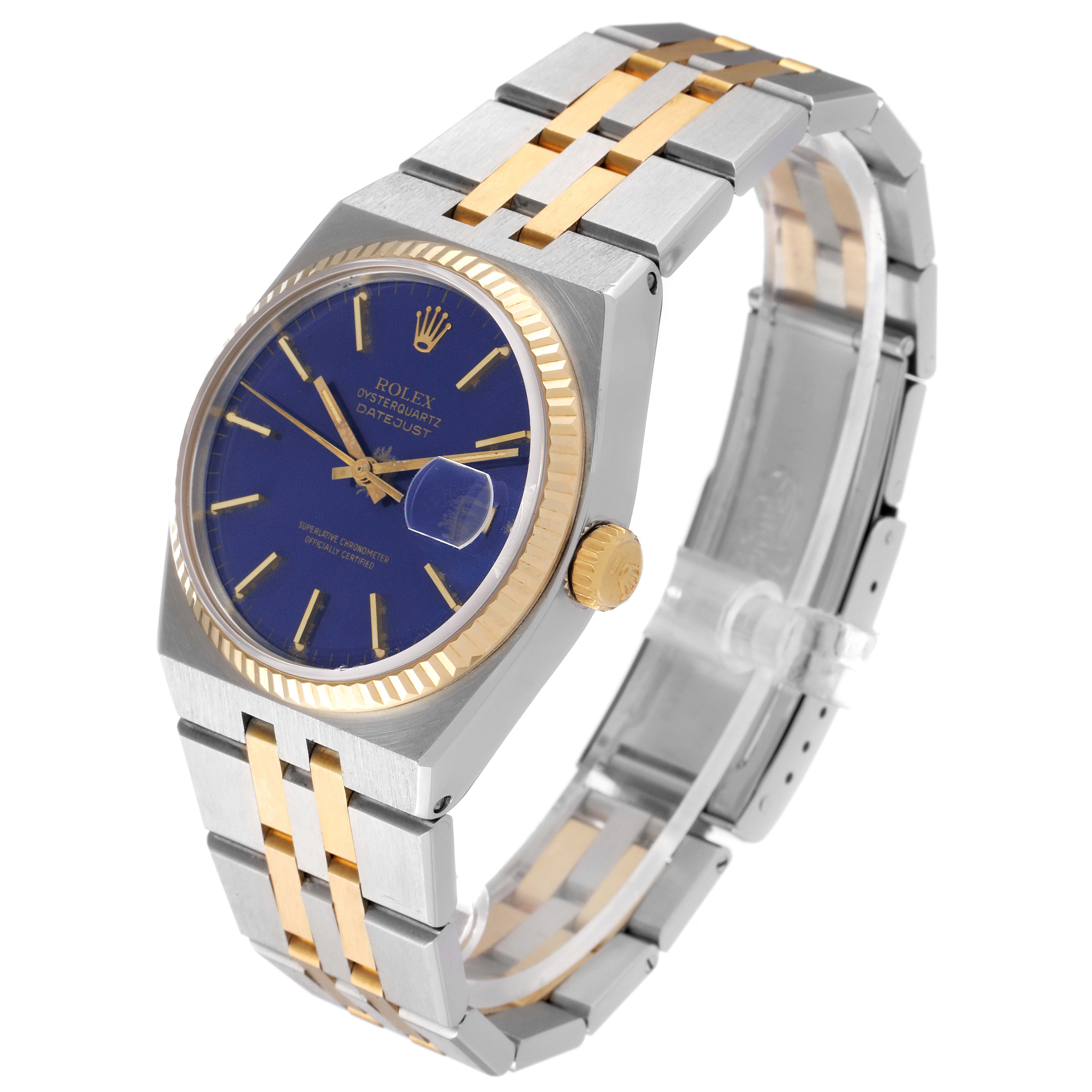 The Rolex Oysterquartz 17013 Men's Steel and Gold (two tone) Blue Dial 17013 Men's Steel and Gold (two tone) Blue Dial watch is shown at an angled view, highlighting the blue dial, gold crown, and two-tone bracelet.